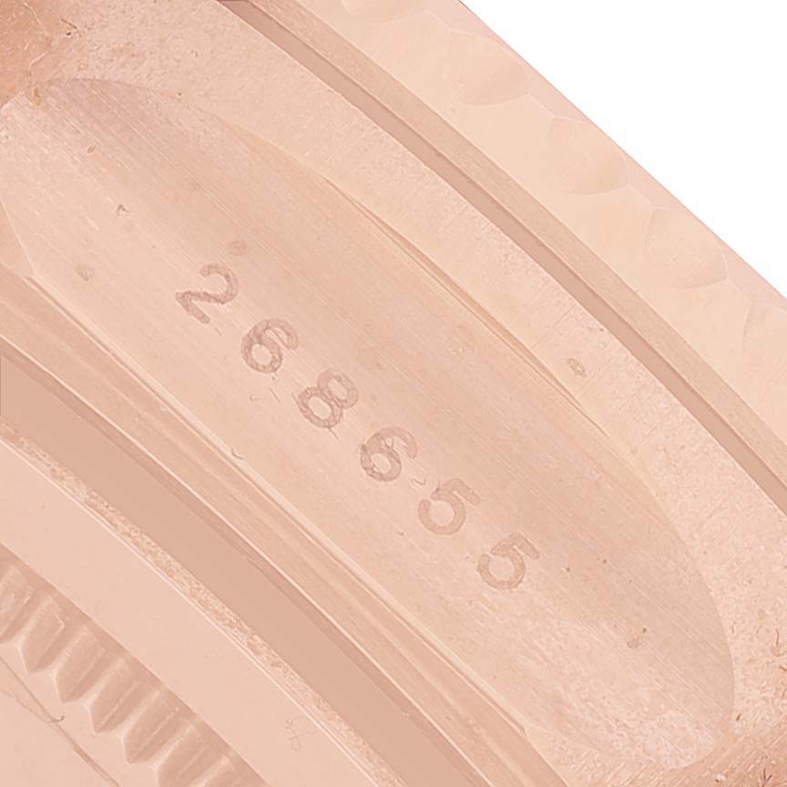 The image shows a close-up angle of the underside of the Rolex Yacht-Master 268655 Men's Rose Gold Black Dial's bracelet or case with reference number engraving.