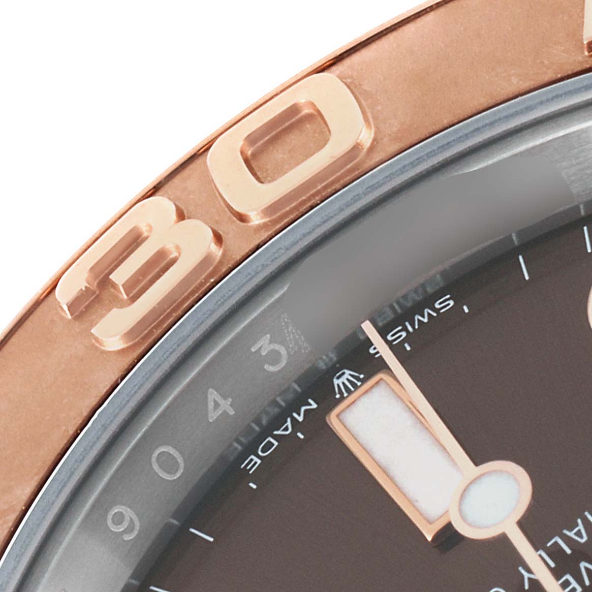 The image shows a close-up of the bezel and dial of a Rolex Yacht-Master 126621 Men's Steel and Gold (two tone) Brown Dial 126621 Men's Steel and Gold (two tone) Brown Dial watch, focusing on the number 30 and part of the minute hand.