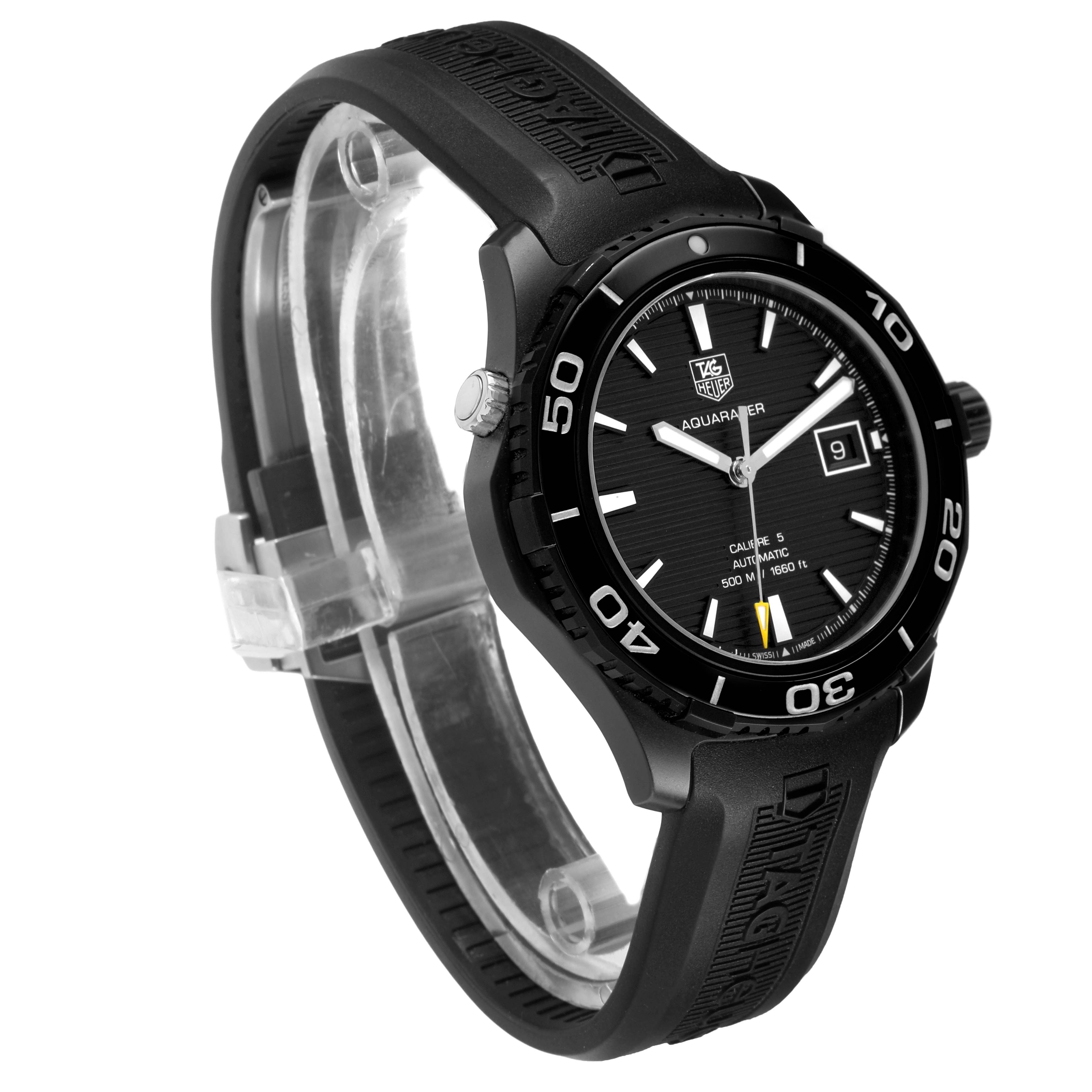 The Tag Heuer Aquaracer WAK2180.FT6027 Men's Titanium Black Dial is shown at a three-quarter angle, highlighting the black dial and rubber strap with engraved branding.