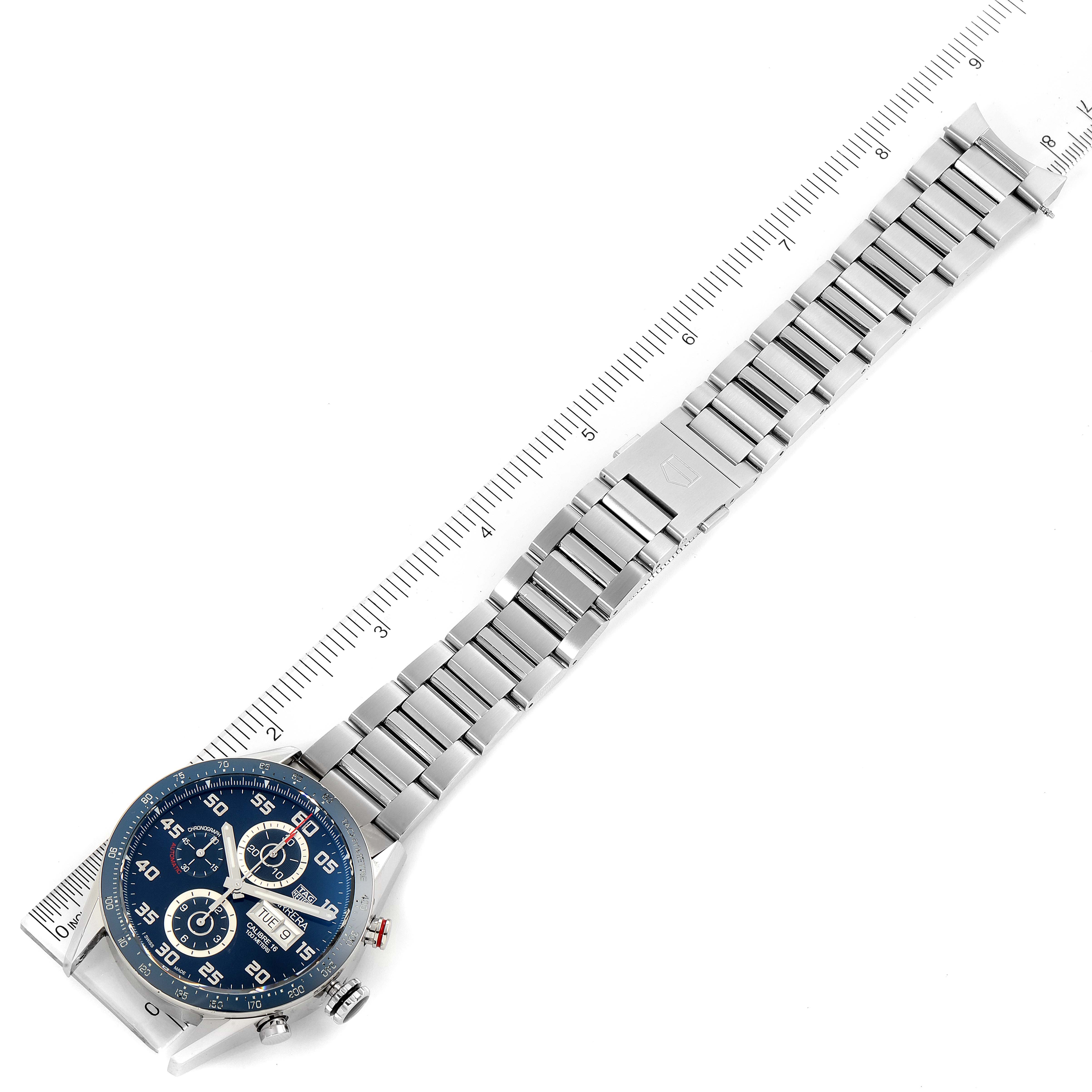 The image shows a Tag Heuer Carrera CV2A1V.BA0738 Men's Stainless Steel Blue Dial CV2A1V.BA0738 Men's Stainless Steel Blue Dial watch laid flat with a visible blue dial and steel bracelet band.