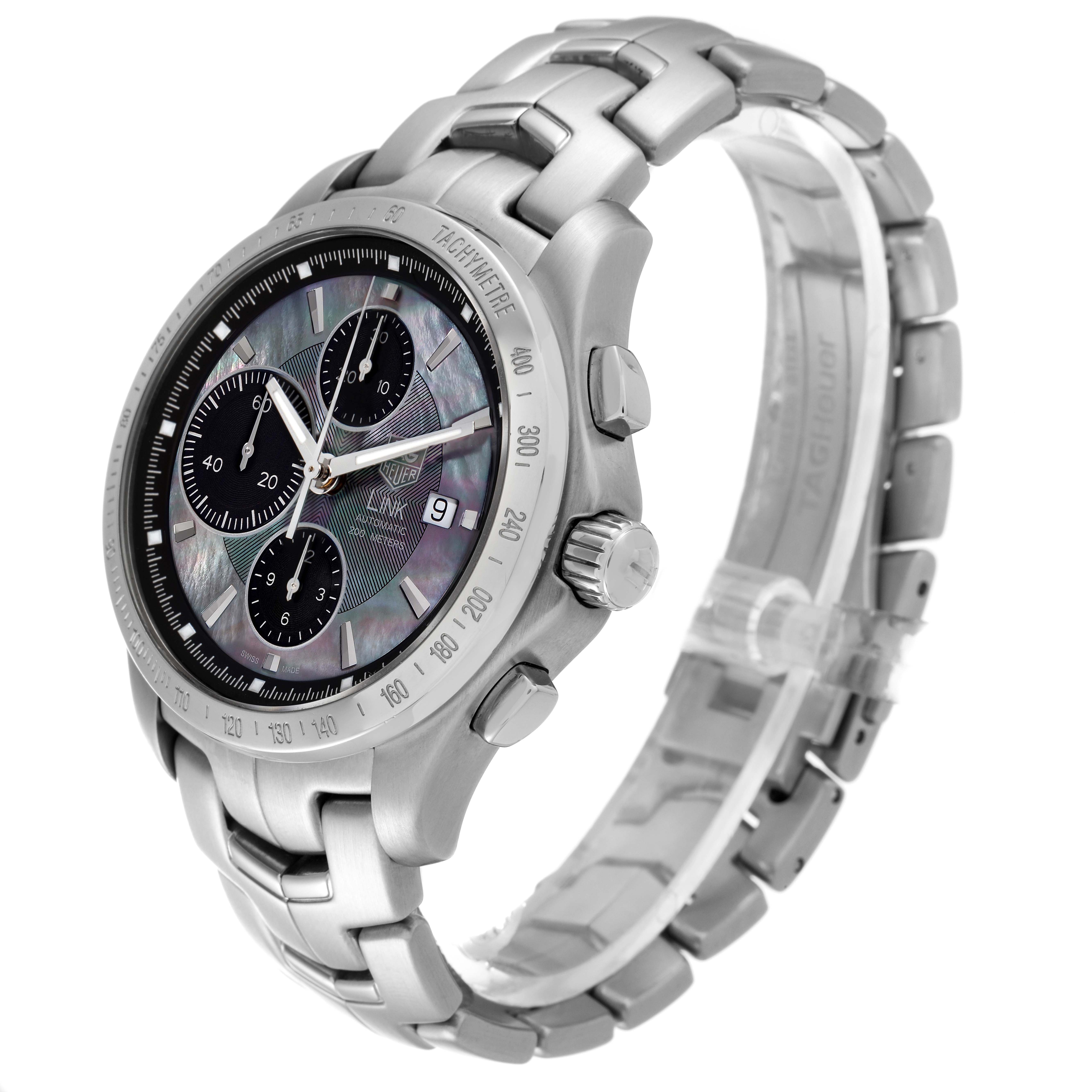 The Tag Heuer Link watch is shown from an angled side view, revealing the face, band, crown, and pushers.