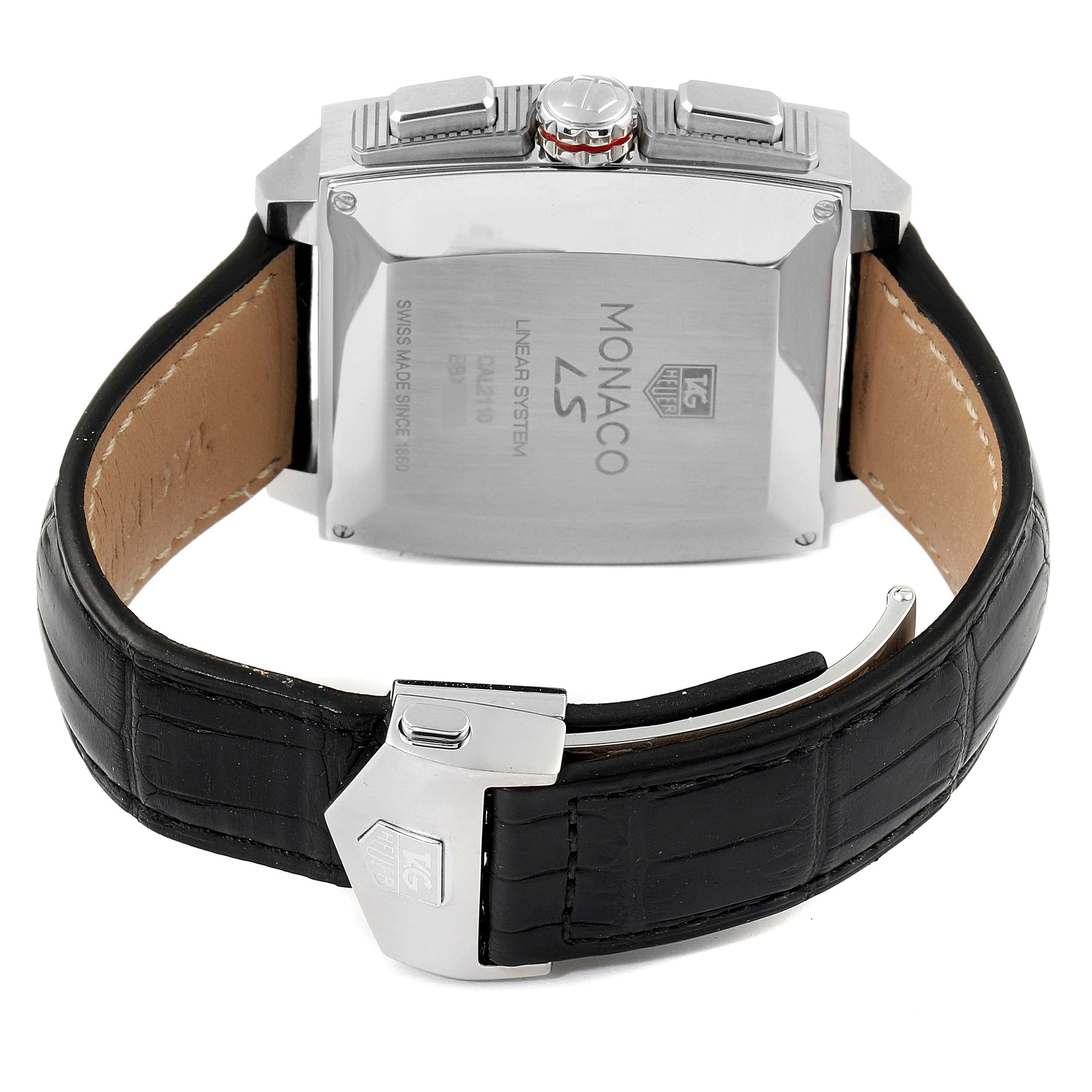 The image shows the back view of a Tag Heuer Monaco CAL2110.FC6257 Men's Stainless Steel Black Dial CAL2110.FC6257 Men's Stainless Steel Black Dial watch, highlighting the case back, crown, pushers, and black leather strap.