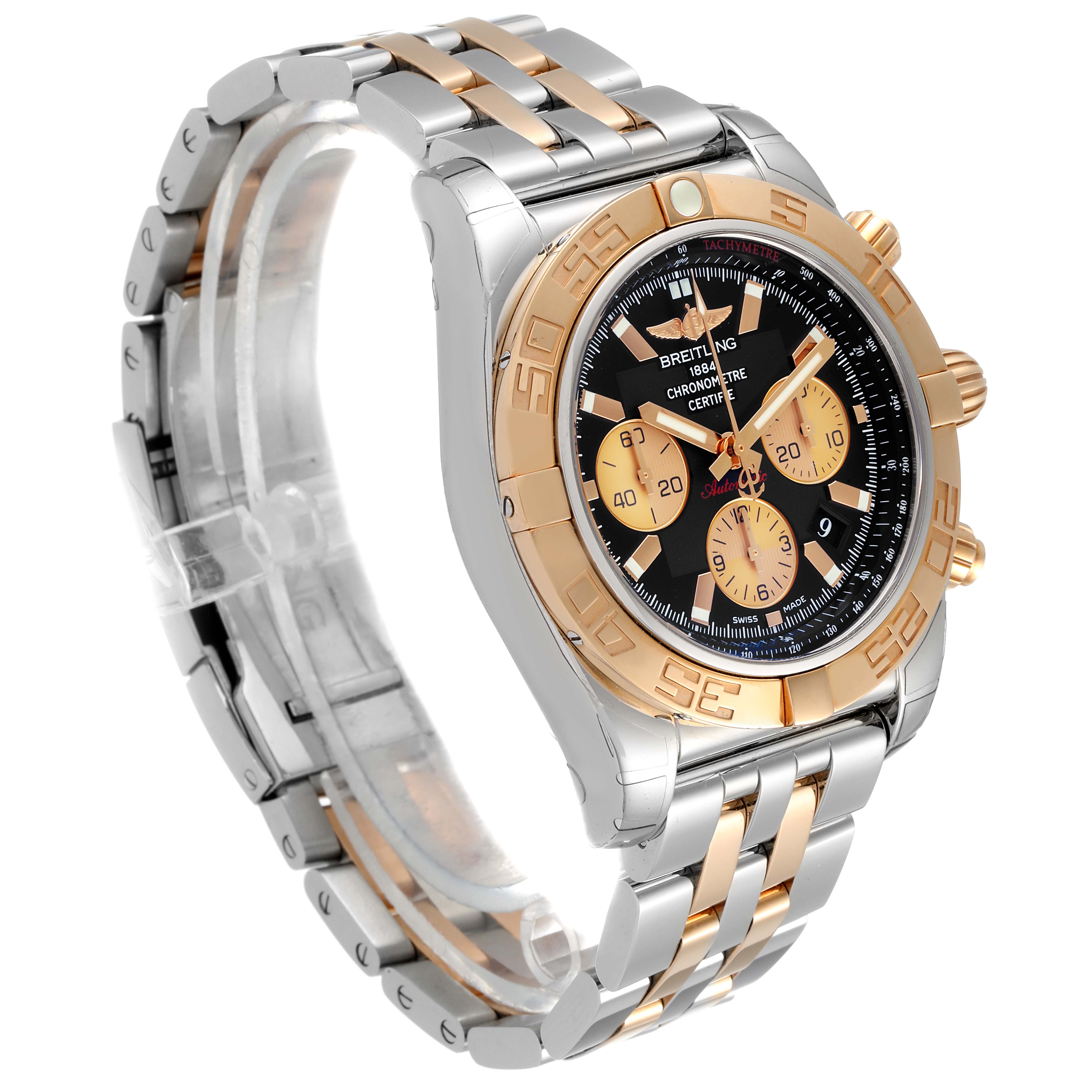 The Breitling Chronomat CB011012/C790 Men
s Steel and Gold (two tone) Black Dial CB011012/C790 Men
s Steel and Gold (two tone) Black Dial watch is shown at a three-quarter angle, displaying its stainless steel and gold bracelet, bezel, and dial.