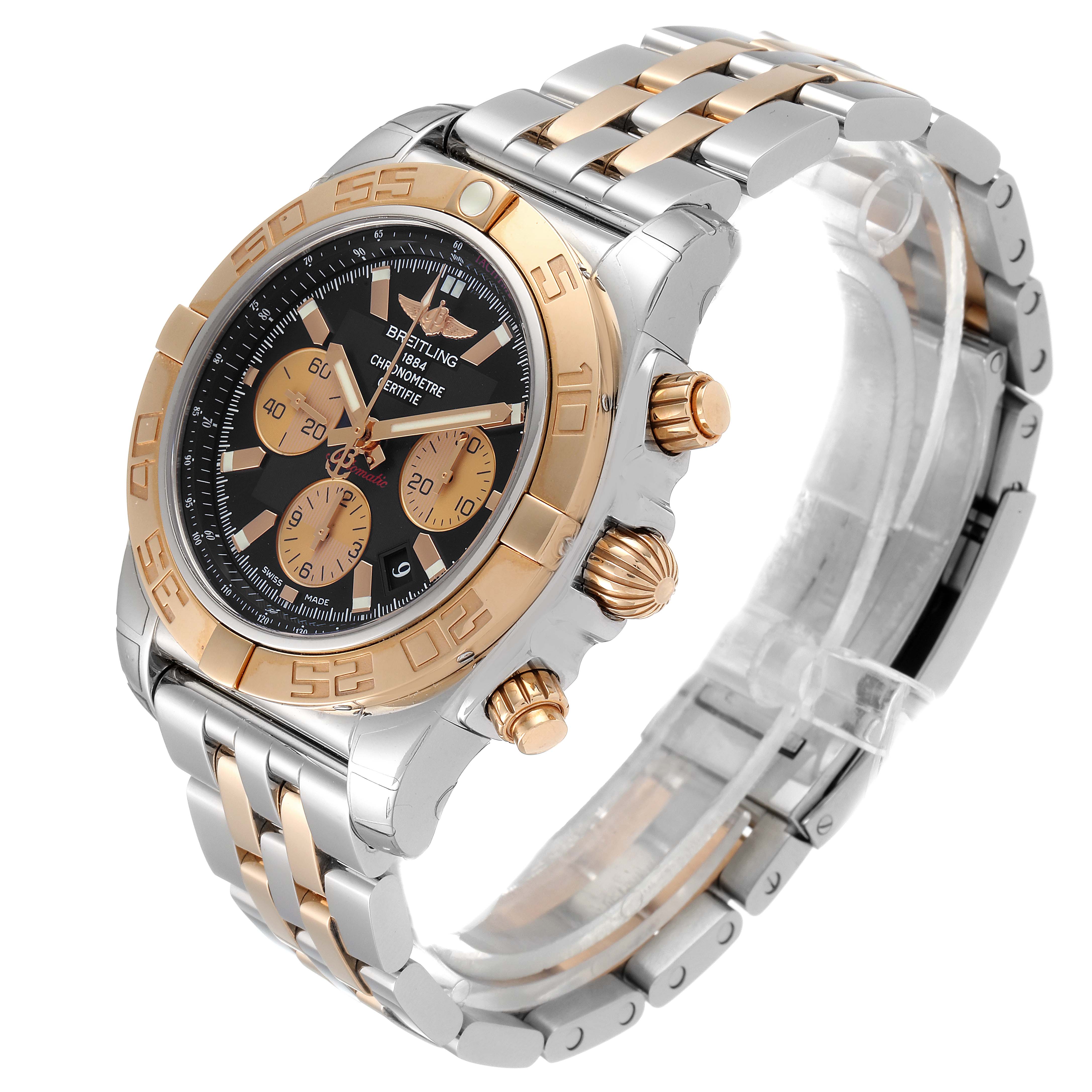 The Breitling Chronomat CB011012/C790 Men
s Steel and Gold (two tone) Black Dial CB011012/C790 Men
s Steel and Gold (two tone) Black Dial watch is shown at an oblique angle, highlighting the two-tone bracelet, bezel, and chronograph dials.