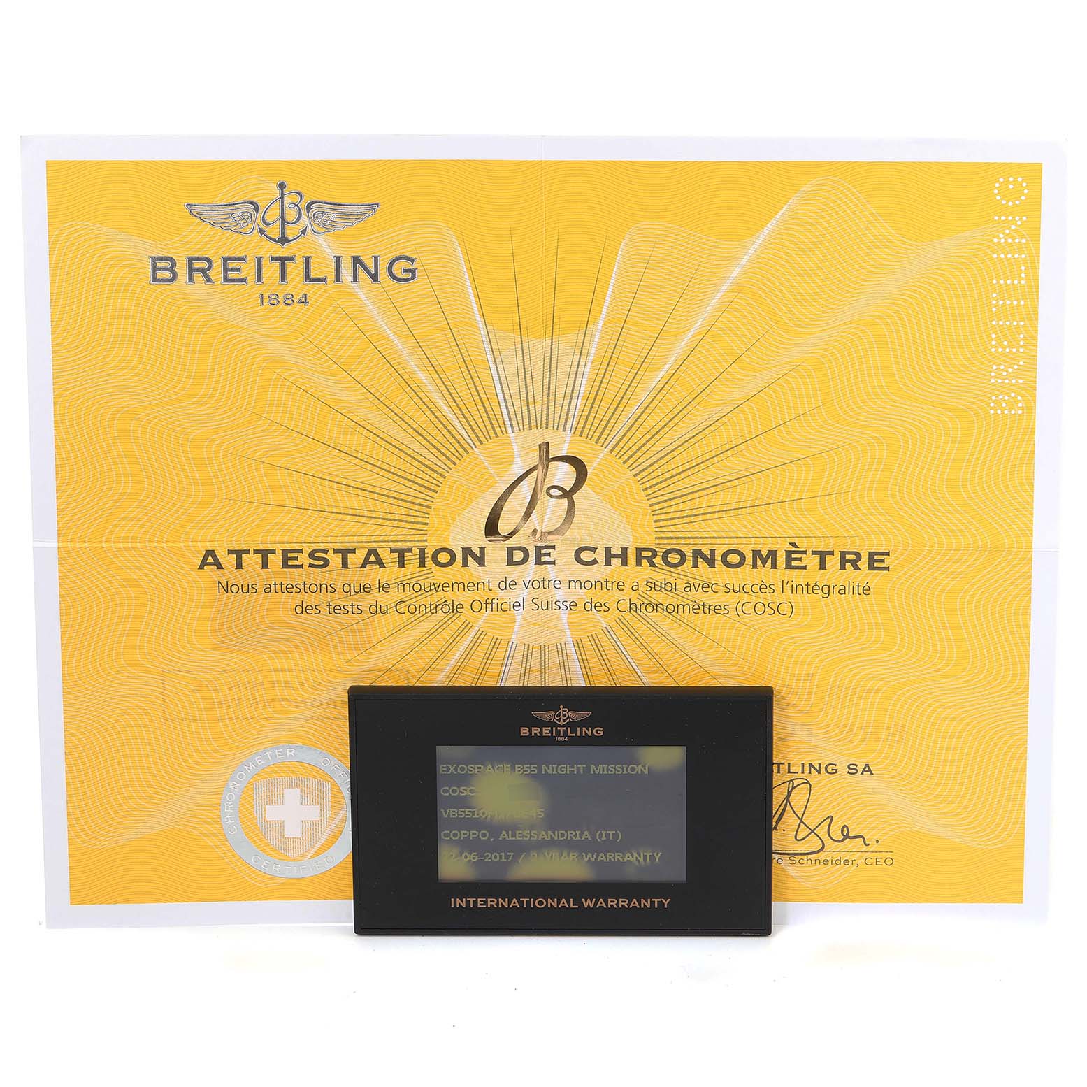This is a Breitling Professional Series VB5510 Men
s Titanium Black Dial VB5510 Men
s Titanium Black Dial watch certificate showing a yellow "Attestation de Chronomètre" and an international warranty card.