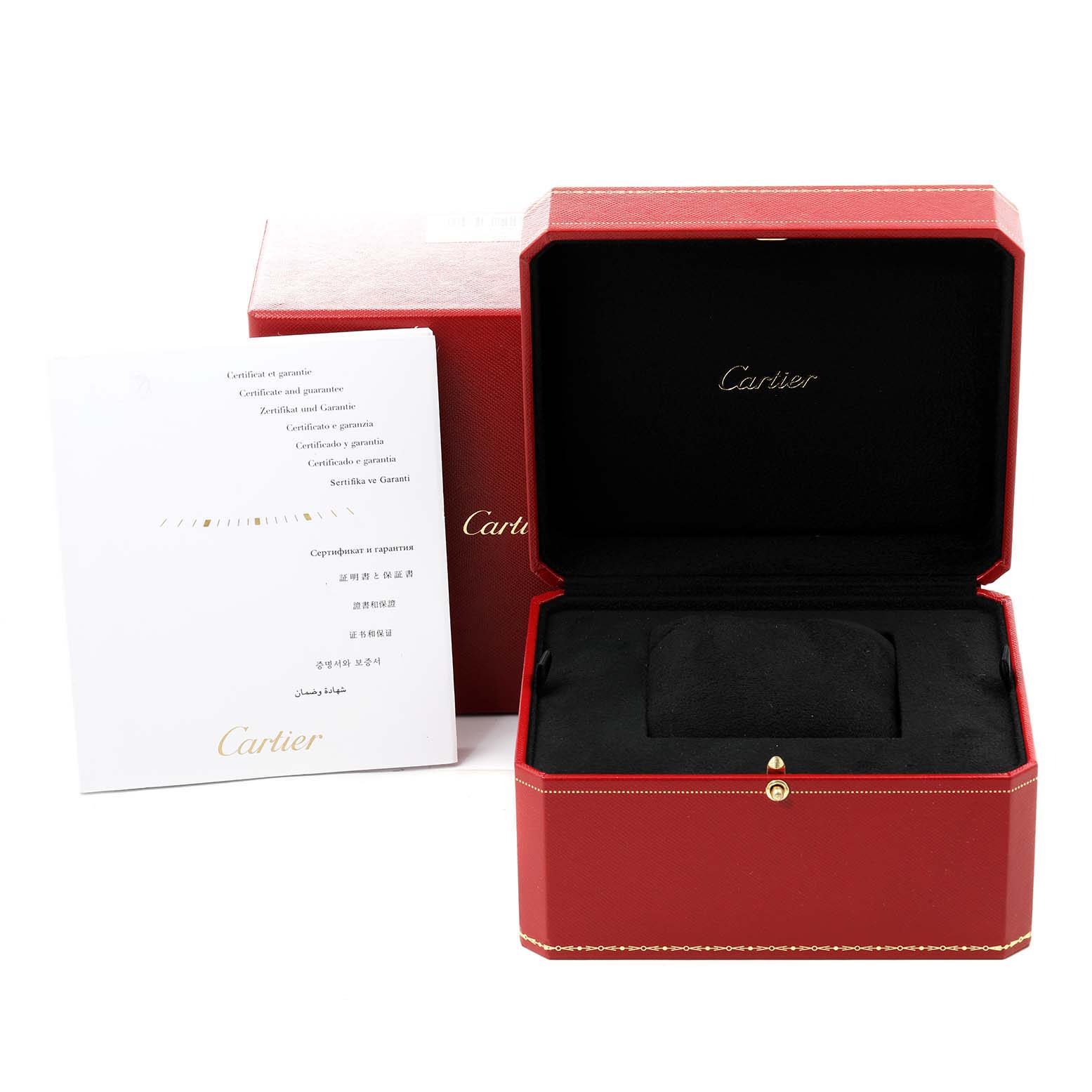 This image shows the open box and warranty documents for the Calibre de Cartier watch by Cartier.