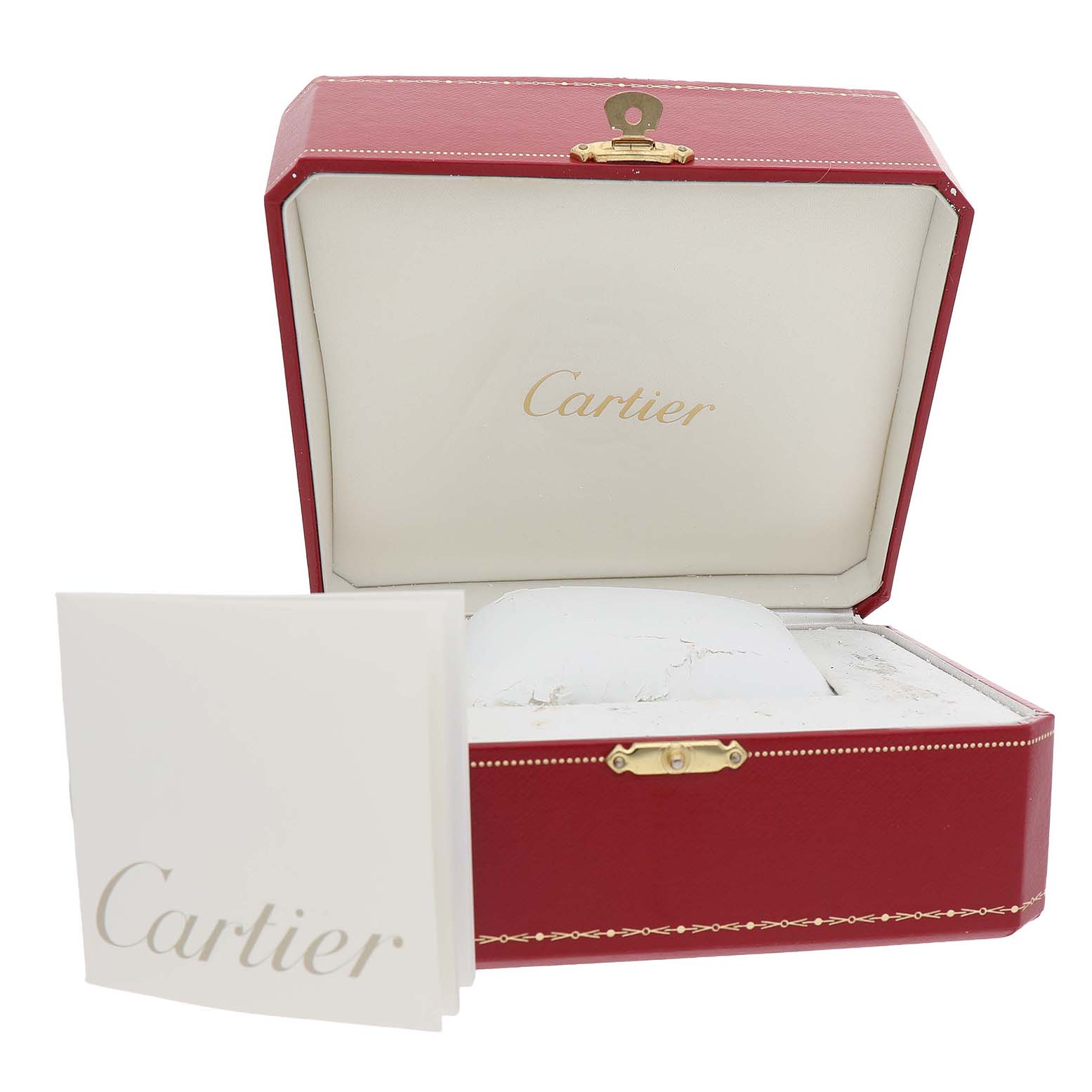 The image shows a Ronde model by Cartier's open box, with a pillow and booklet visible.