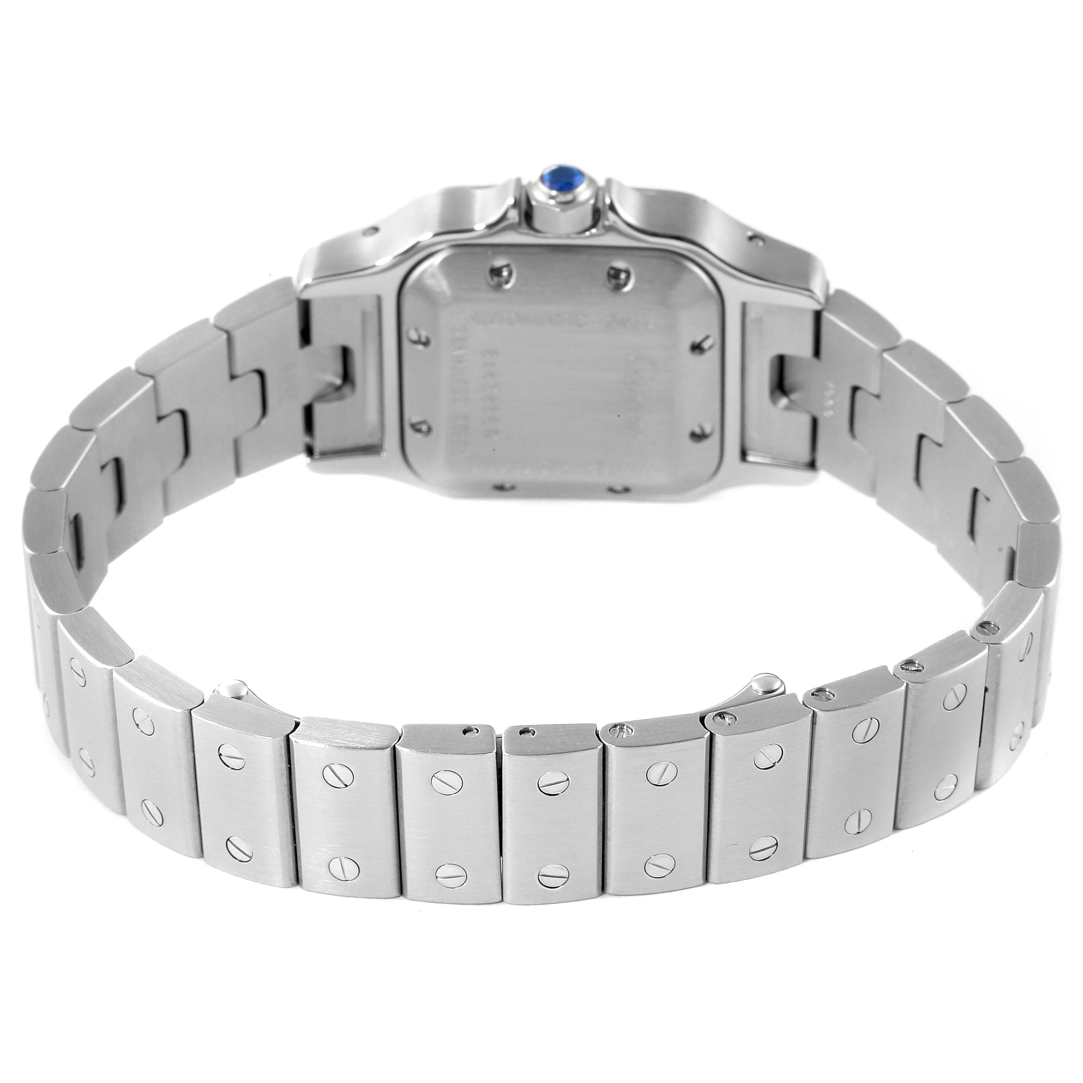 The image shows the back of a Cartier Santos W20044D6 Women's Stainless Steel Silver Dial W20044D6 Women's Stainless Steel Silver Dial watch, highlighting the stainless steel bracelet and the case back.
