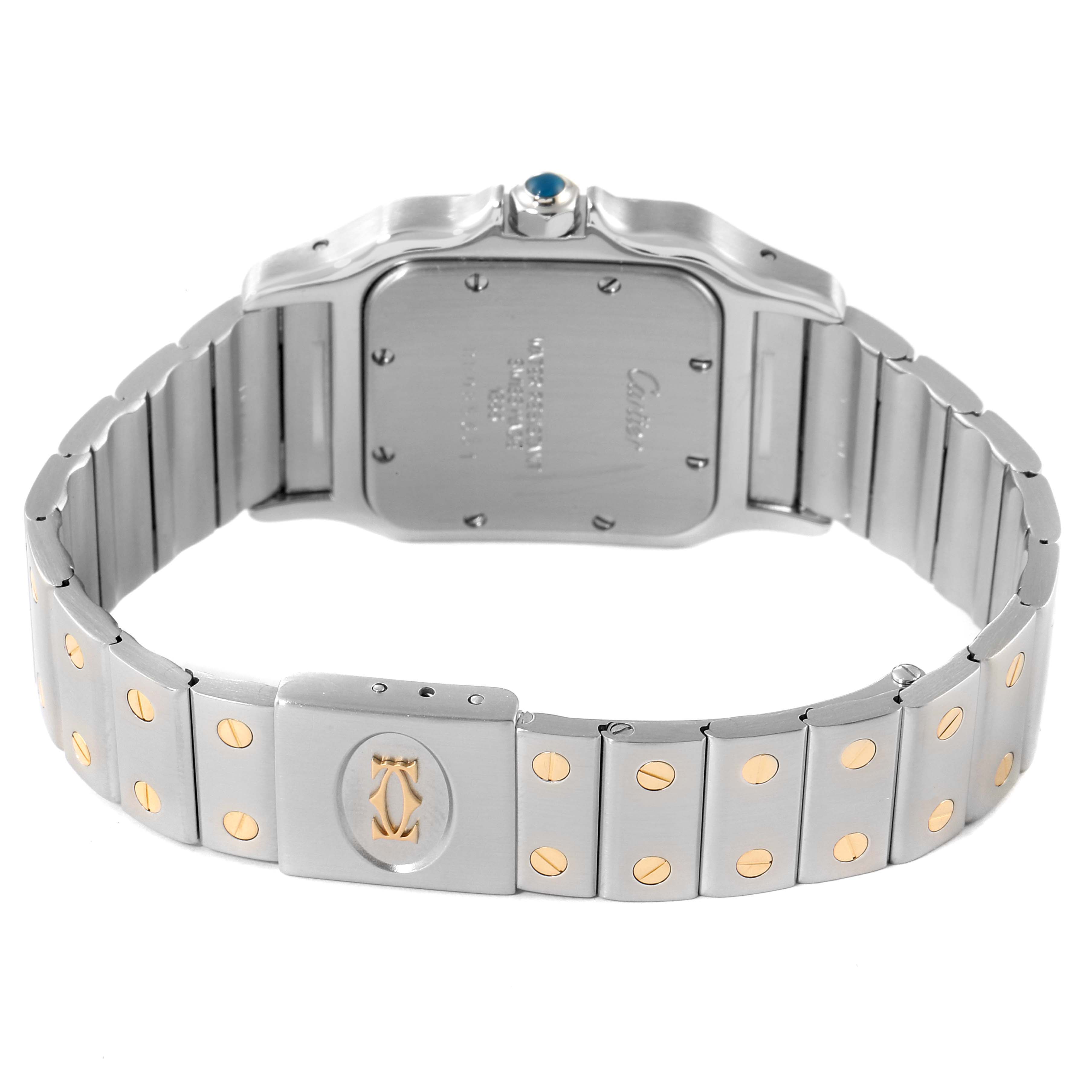 The image shows the back view of a Cartier Santos 1566 Men's Steel and Gold (two tone) Grey Dial 1566 Men's Steel and Gold (two tone) Grey Dial watch, highlighting the stainless steel case and bracelet with gold screw accents.
