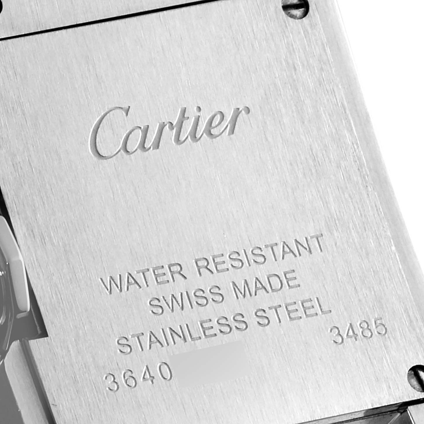 This image shows the back case of a Cartier Tank Anglaise W5310022 Women's Stainless Steel Silver Dial W5310022 Women's Stainless Steel Silver Dial watch displaying model details and water resistance.