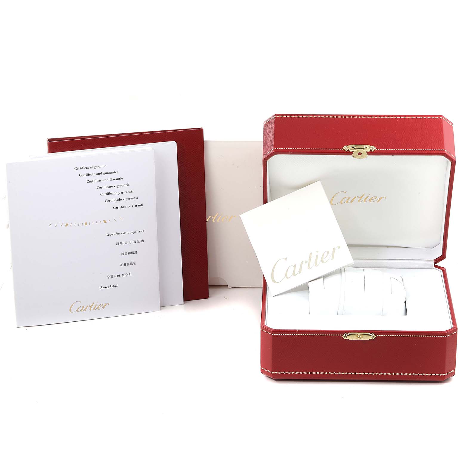 The image shows the packaging and accessories, including the box and booklets, for the Cartier Tank Anglaise W5310022 Women's Stainless Steel Silver Dial W5310022 Women's Stainless Steel Silver Dial model watch.