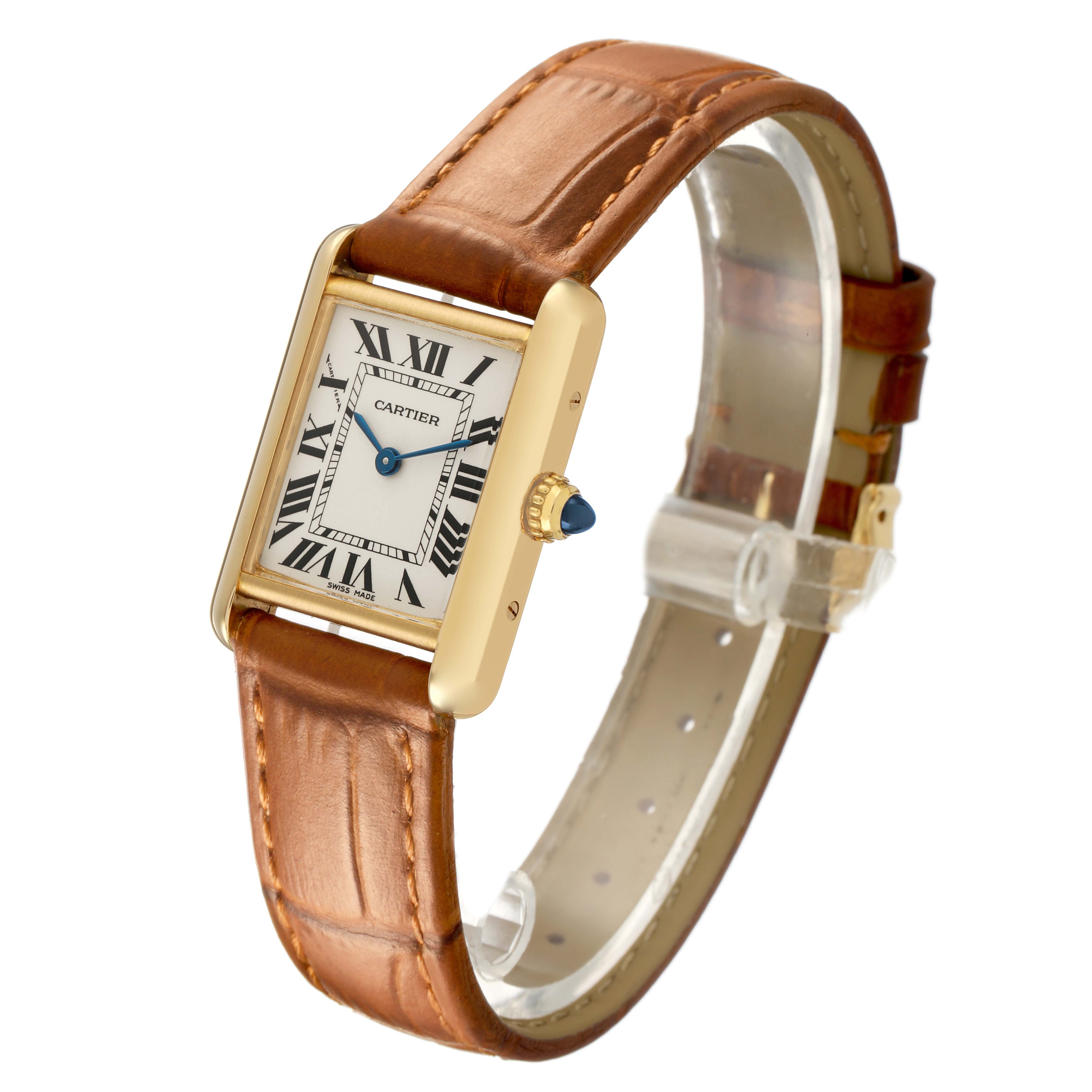 The Cartier Tank Louis W1529856 Women's Yellow Gold Silver Dial watch is shown at an angled side view, highlighting its rectangular face, Roman numerals, and brown leather strap.