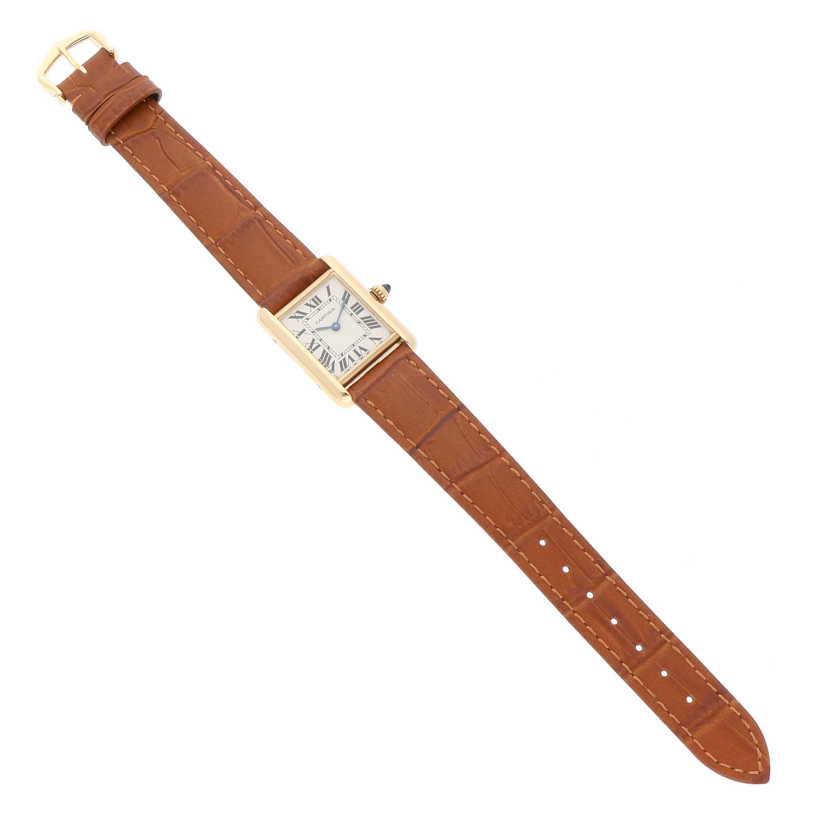 The Cartier Tank Louis W1529856 Women's Yellow Gold Silver Dial watch is shown from a top-down angle, displaying the dial, rectangular case, and brown leather strap.