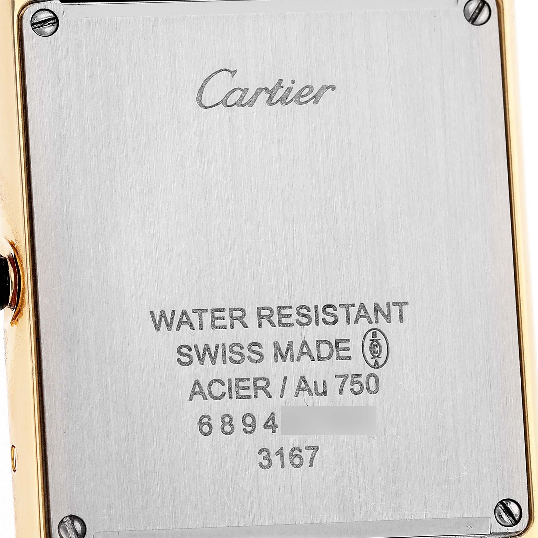 The image shows the back case of a Cartier Tank Solo W5200004 Men's Yellow Gold Red Dial watch, displaying the brand logo and specifications.