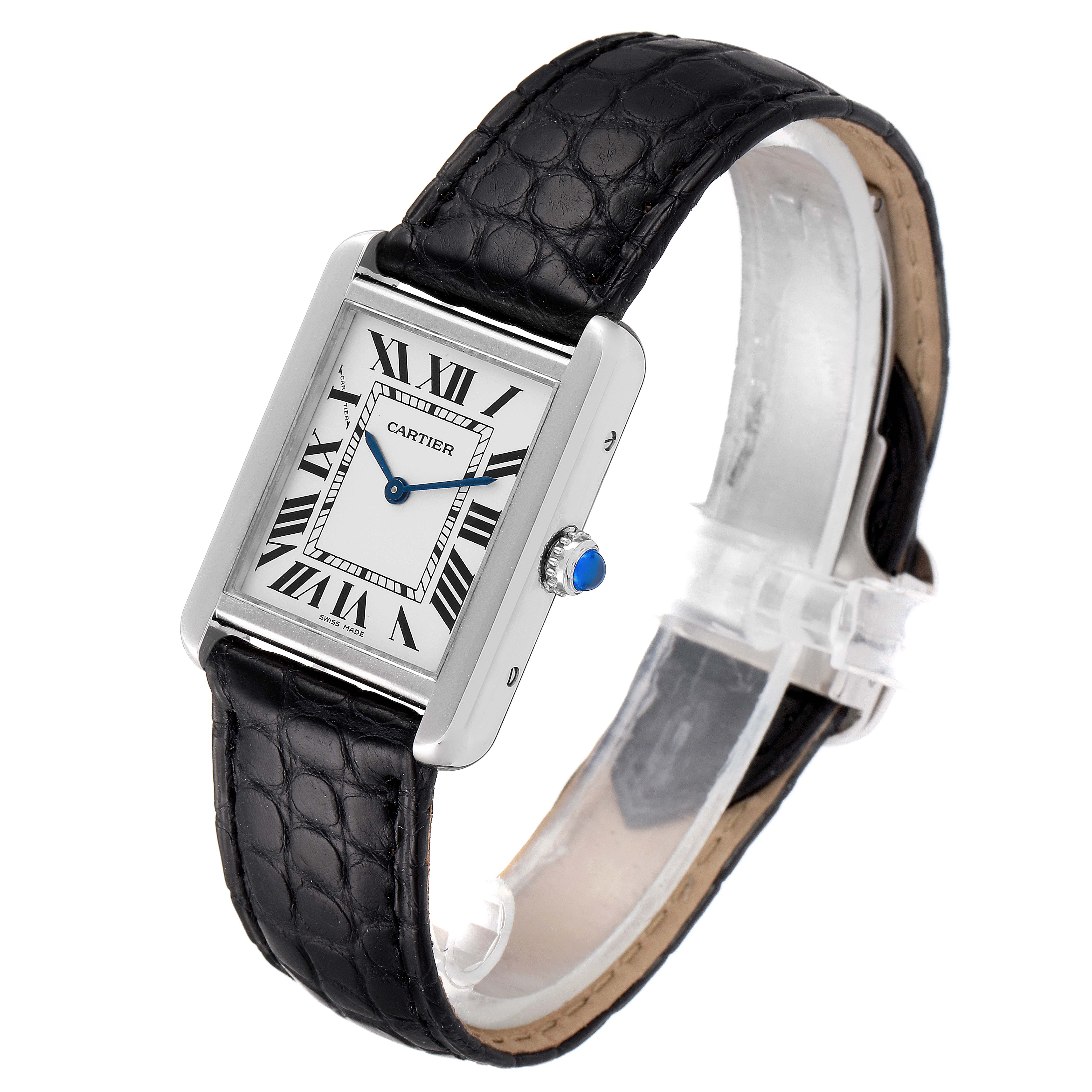 The image shows a Cartier Tank Solo W1018255 Women
s Stainless Steel Silver Dial W1018255 Women
s Stainless Steel Silver Dial watch at an angled side view, highlighting its rectangular face and black leather strap.