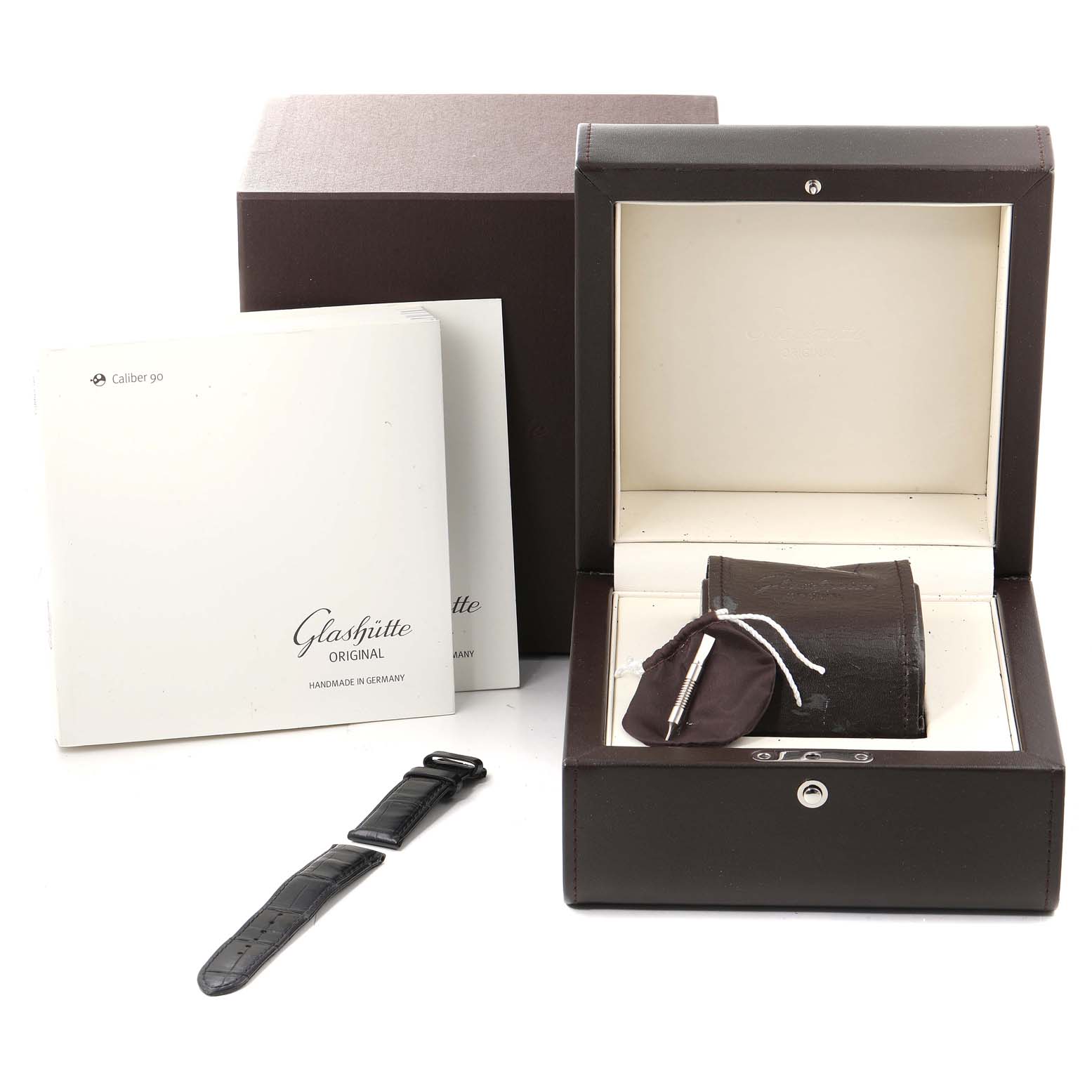 The image shows the packaging, manuals, watch strap, and box for the Glashutte Pano 1-90-02-42-32-05 Men's Stainless Steel Silver Dial 1-90-02-42-32-05 Men's Stainless Steel Silver Dial model watch.