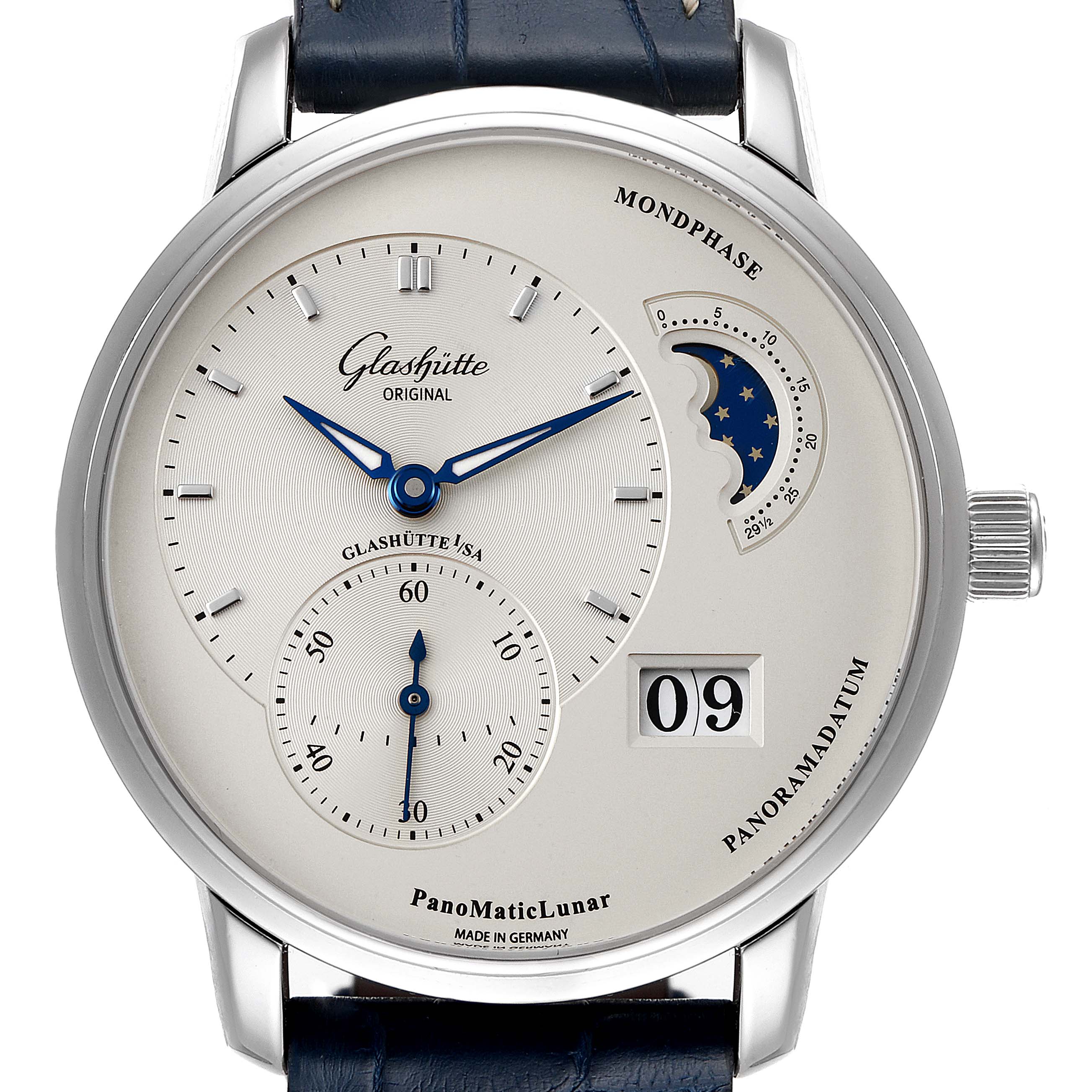 The Glashütte Pano model watch is shown from a front angle, displaying its dial with moon phase, date, and sub-dial features.