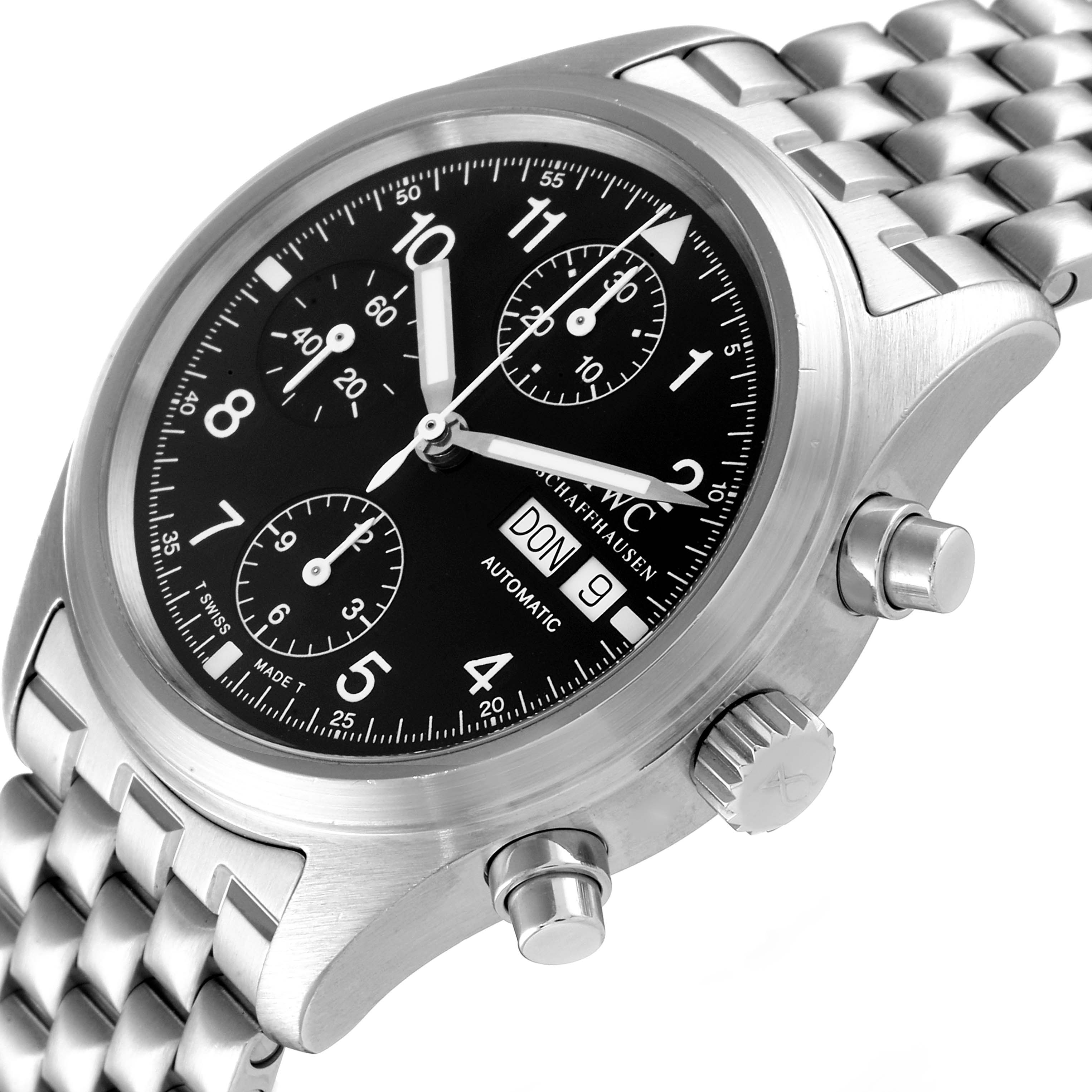 The image shows an IWC Pilot IW370607 Men's Stainless Steel Black Dial IW370607 Men's Stainless Steel Black Dial watch from an angled top view, highlighting the dial, bezel, crown, and part of the bracelet.
