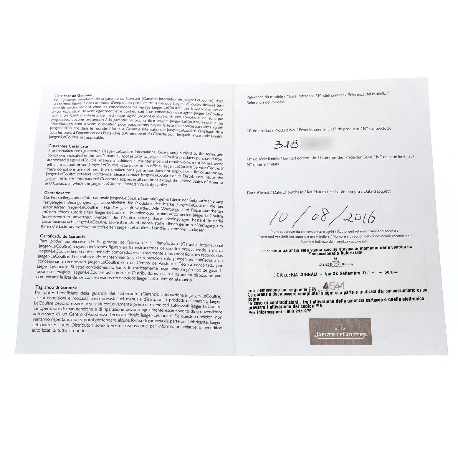 The image shows a warranty certificate booklet for a Jaeger-LeCoultre Reverso watch, open to reveal text and product information.