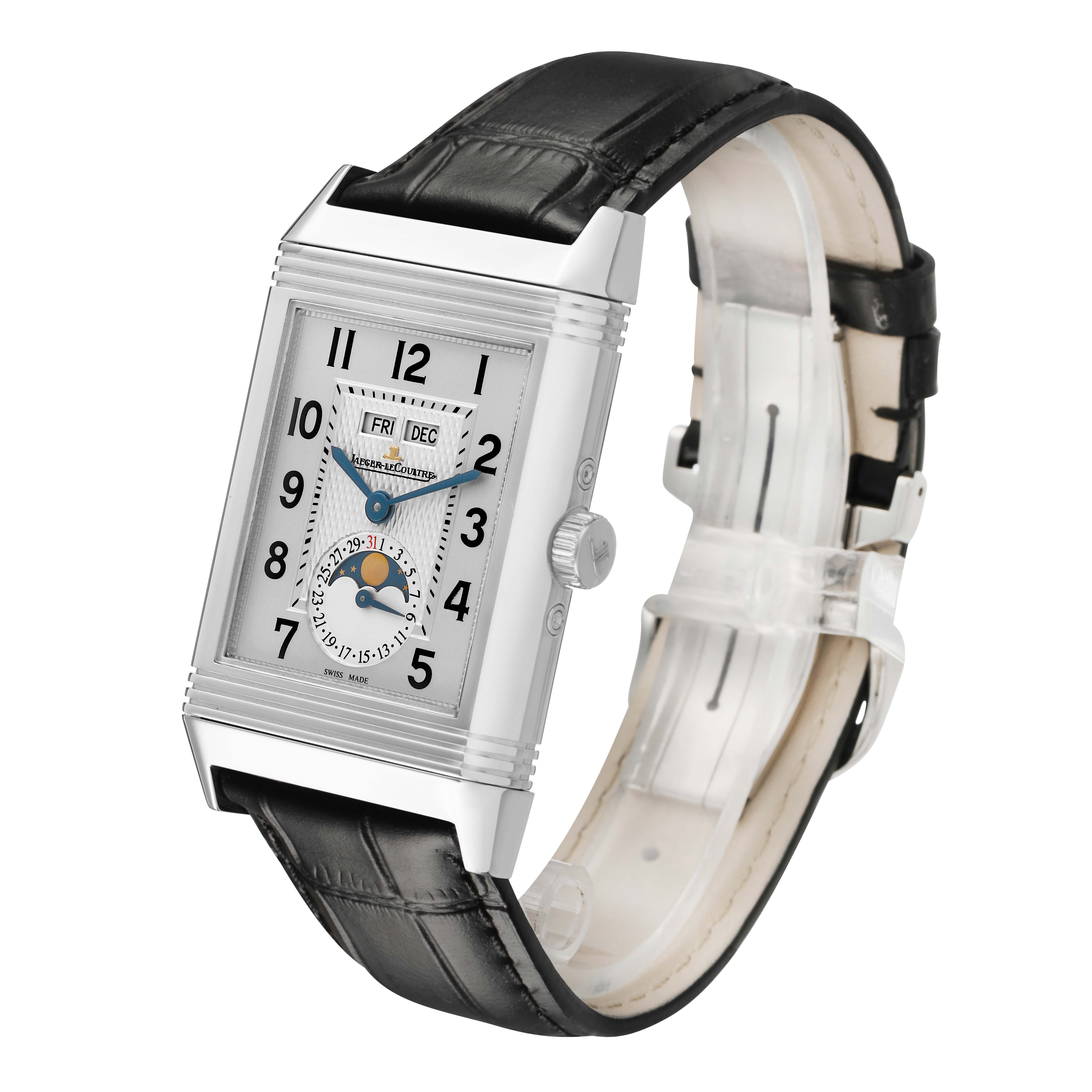 The Jaeger-LeCoultre Reverso watch is shown at a three-quarter angle, highlighting the dial, case, and black leather strap.