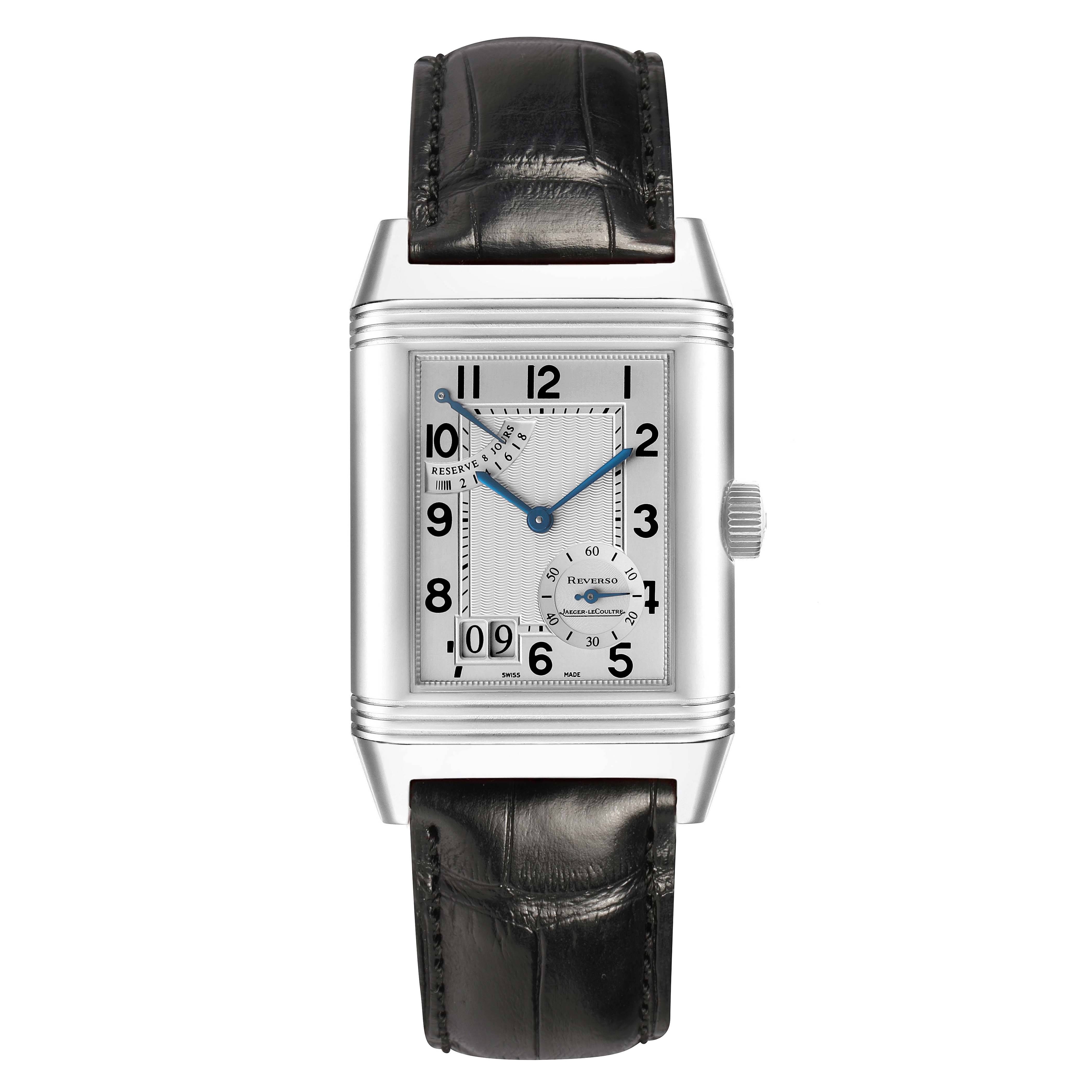 The Jaeger-LeCoultre Reverso watch is shown from a top-down angle, displaying its face, strap, and side crown.