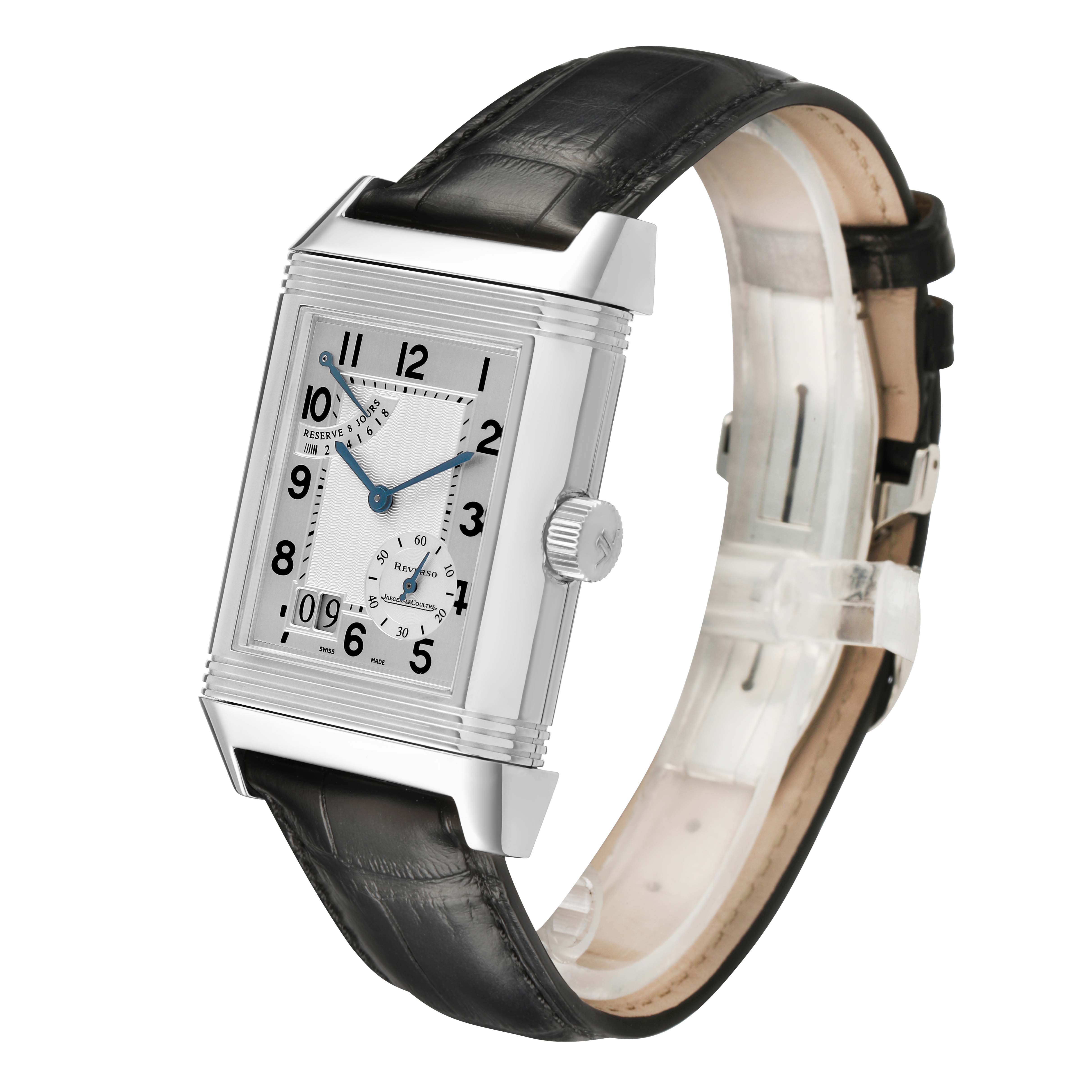 The Jaeger-LeCoultre Reverso watch is shown at a slight angle, highlighting the front face, crown, and leather strap.