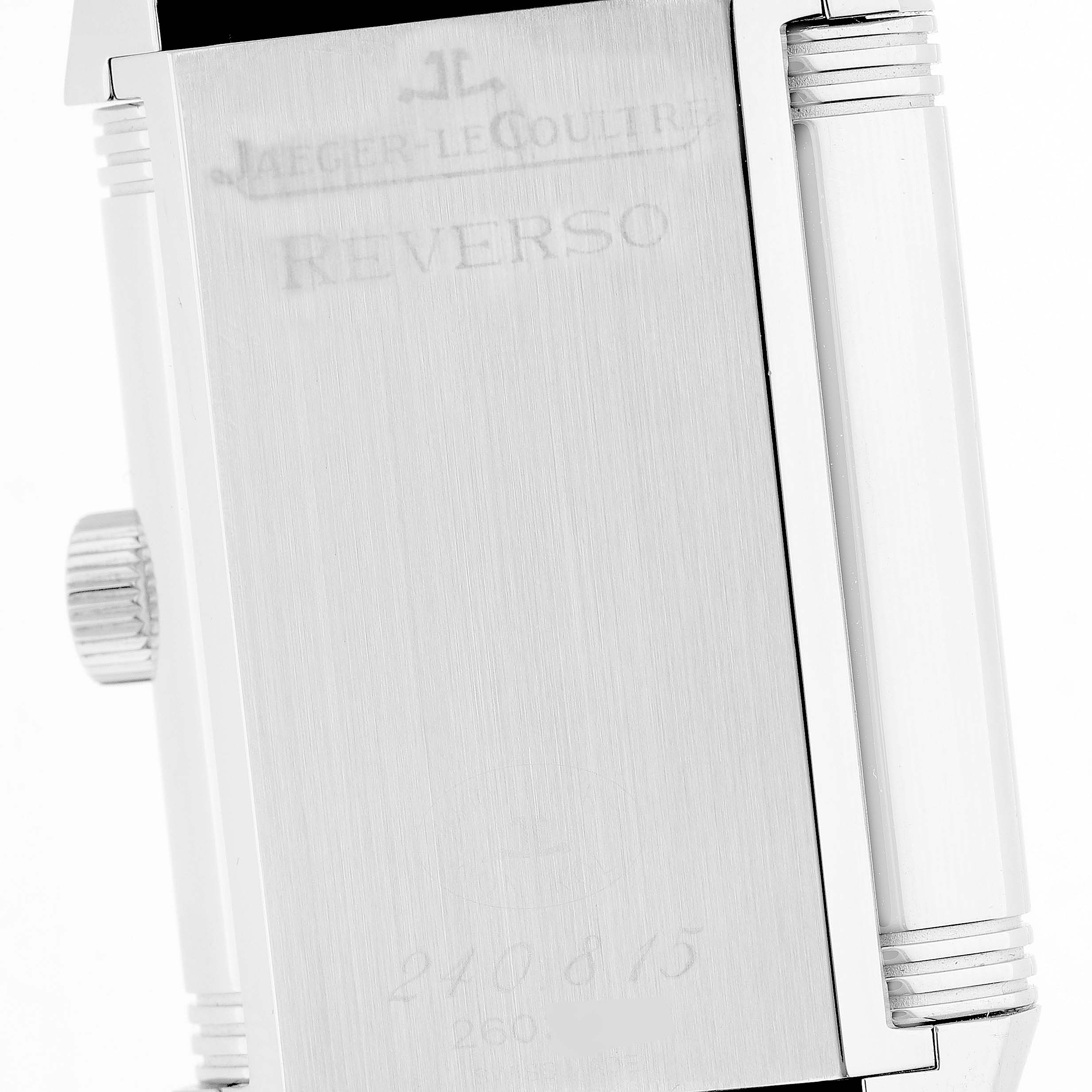 The image shows the back of a Jaeger LeCoultre Reverso Q3008420 / 240.8.15 Men's Stainless Steel Silver Dial watch with visible engravings and the side crown.