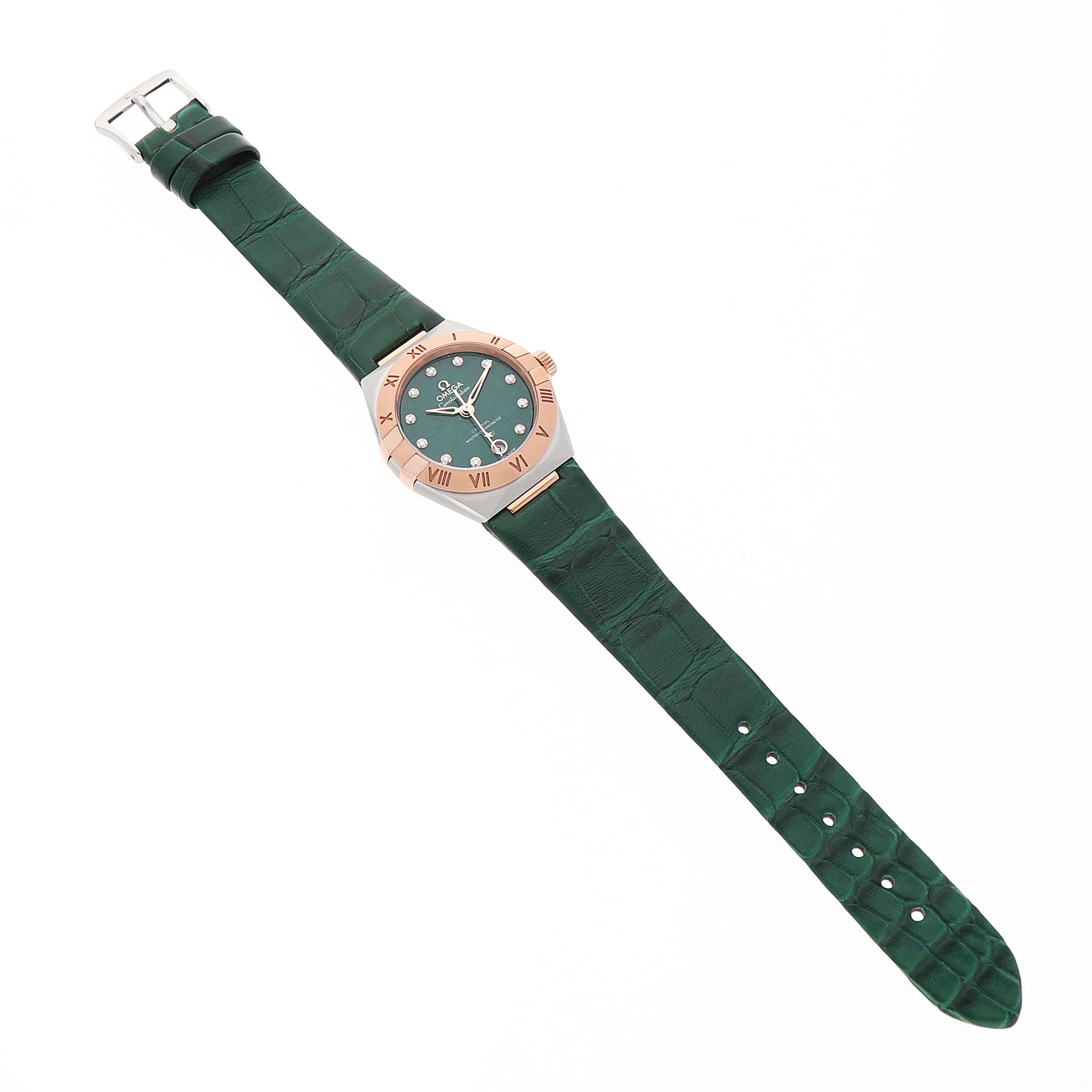 The Omega 131.23.29.20.99.001 Women's Steel and Gold (two tone) Green Dial Constellation 29 Diamond Steel Rose Gold watch is shown from a top angle, displaying the face, bezel, and green strap.