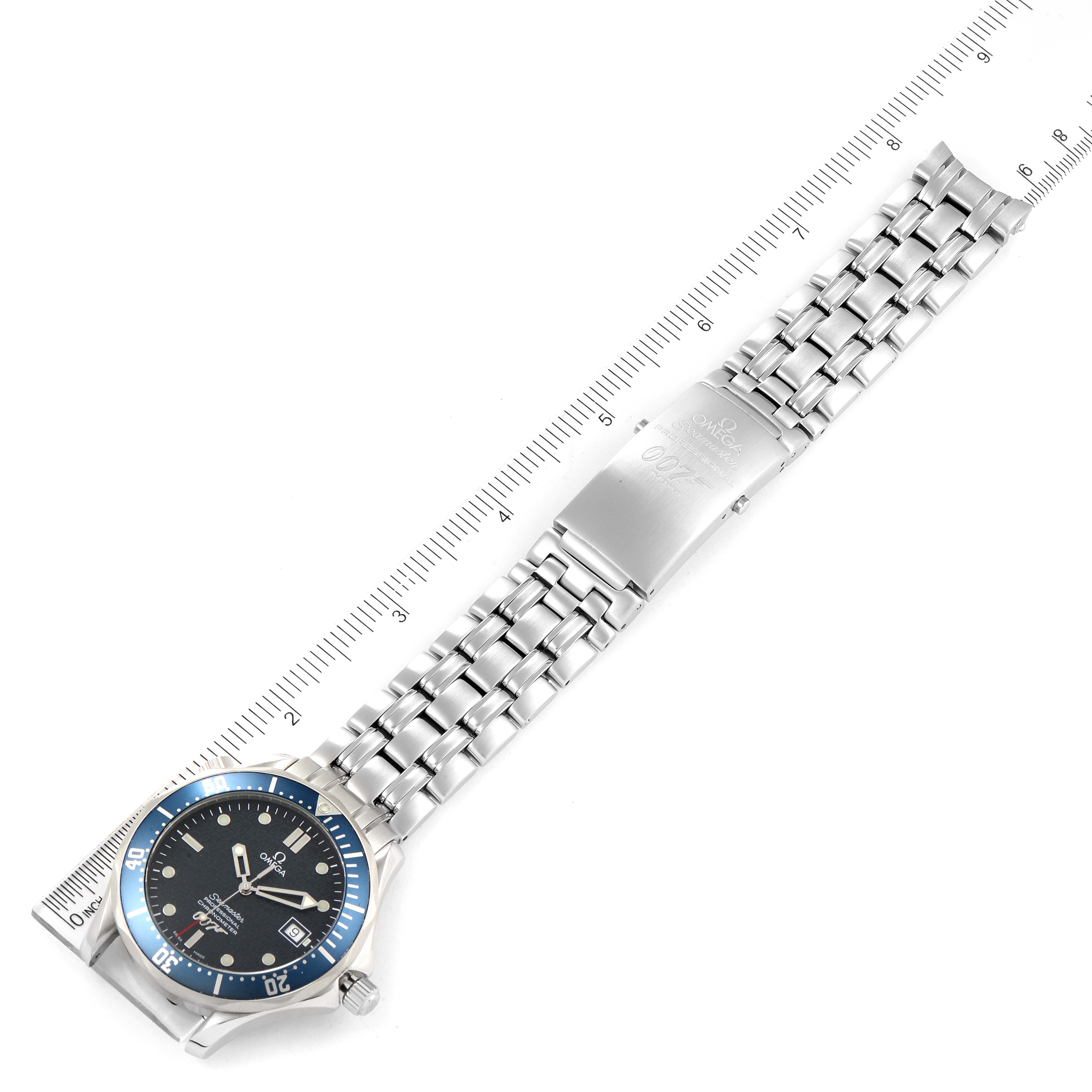 The image shows an Omega Seamaster 2537.80.00 Men's Stainless Steel Blue Dial 2537.80.00 Men's Stainless Steel Blue Dial watch laid flat, displaying the dial, bezel, and metal bracelet next to a ruler for scale.