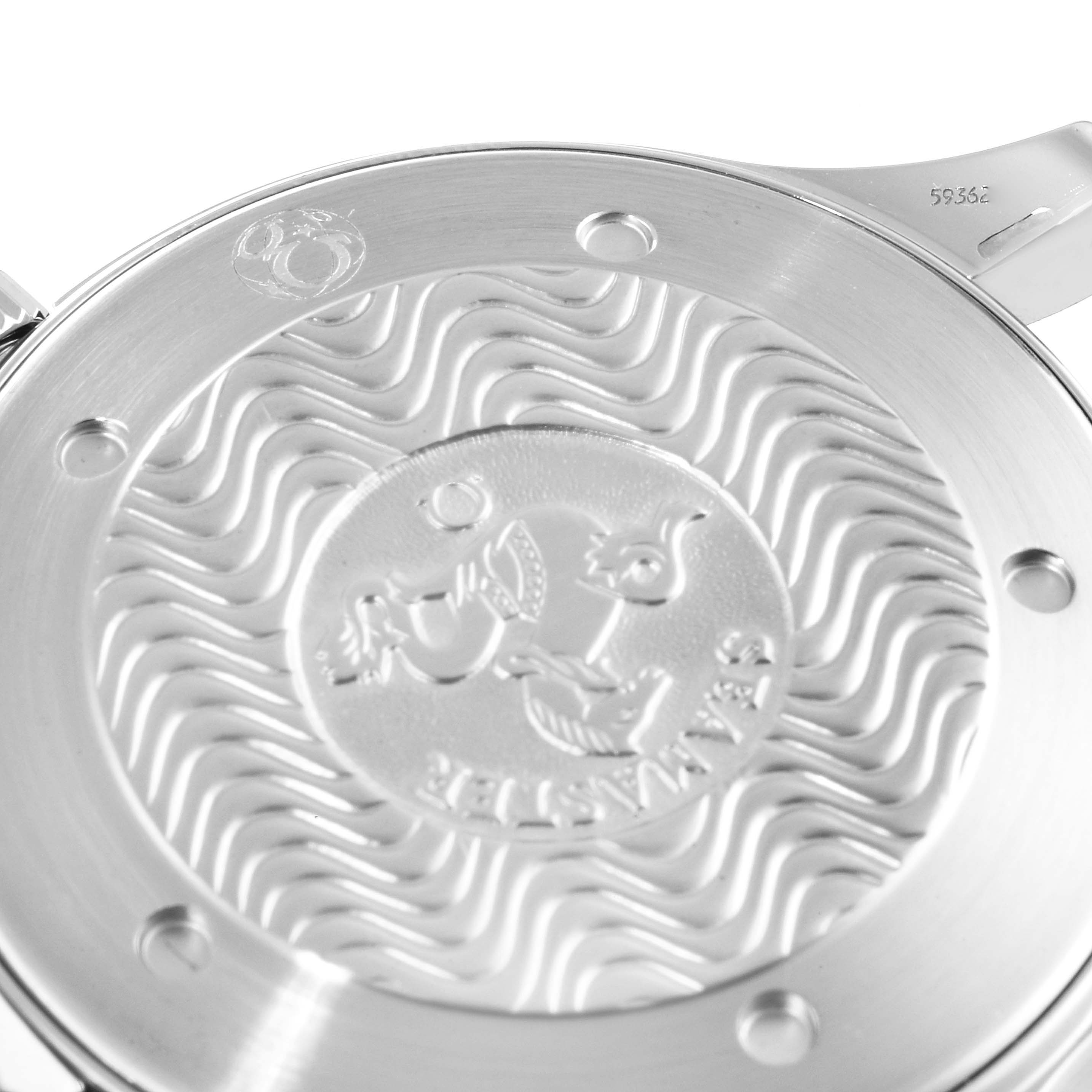 This image shows the stainless steel case back of an Omega Seamaster 2541.80.00 Men's Stainless Steel Blue Dial 2541.80.00 Men's Stainless Steel Blue Dial watch with a wave pattern.