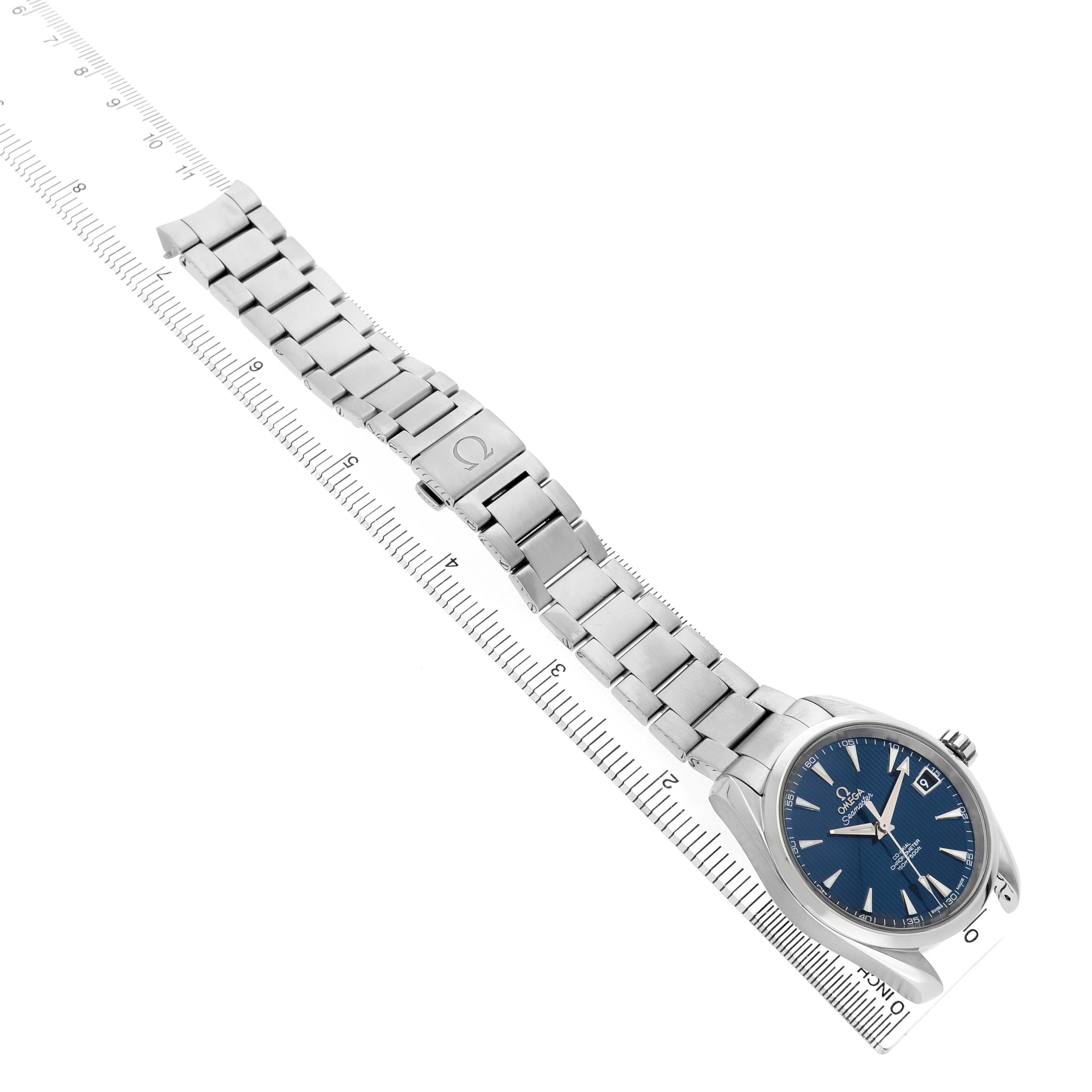 The Omega Aqua Terra 231.10.39.21.03.001 Men's Stainless Steel Blue Dial watch is displayed from a diagonal top view, highlighting the blue face, metal bracelet, and clasp.