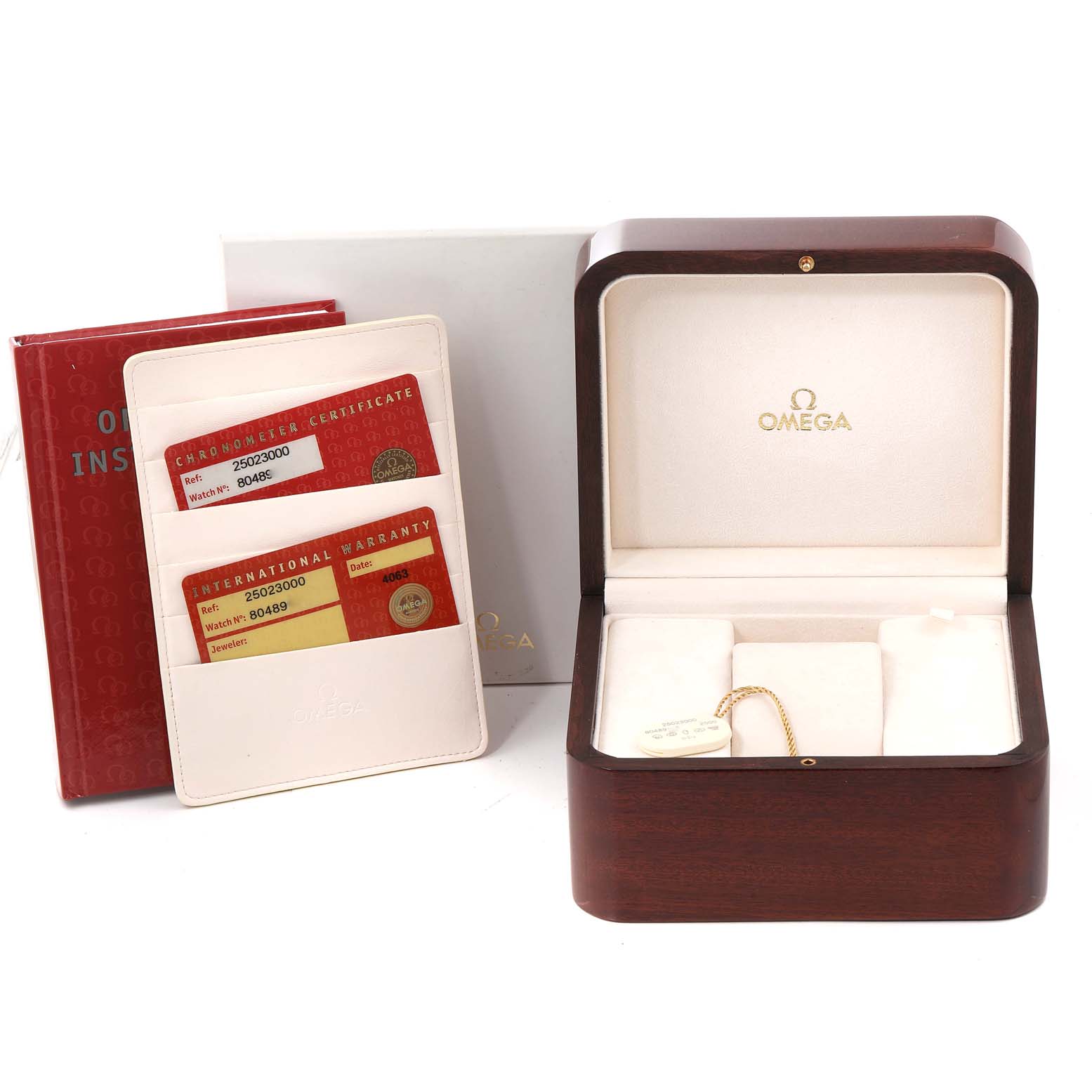 The image shows Omega Aqua Terra 2502.30.00 Men's Stainless Steel Silver Dial 2502.30.00 Men's Stainless Steel Silver Dial accessories including an open wooden watch box, warranty cards, and instruction booklets.