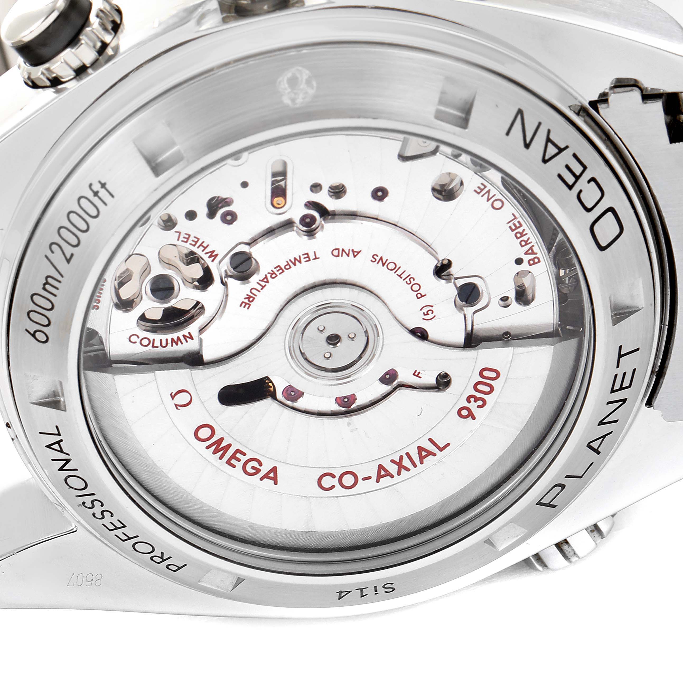 The image shows the back angle of the Omega Planet Ocean 232.30.46.51.01.003 Men
s Stainless Steel Black Dial 232.30.46.51.01.003 Men
s Stainless Steel Black Dial watch, highlighting its movement and internal mechanisms.