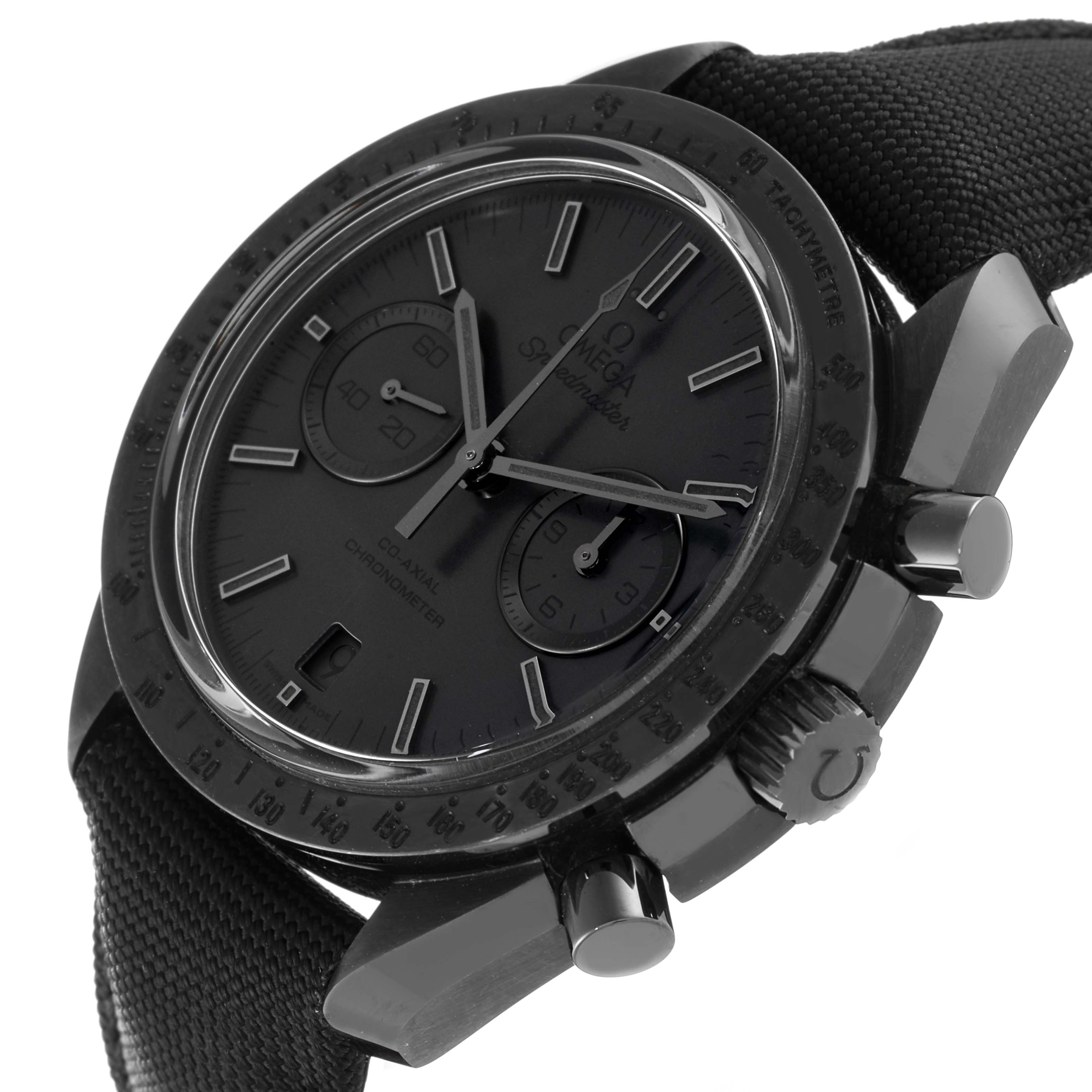 The image shows an Omega Speedmaster 311.92.44.51.01.005 Men's Ceramic Black Dial 311.92.44.51.01.005 Men's Ceramic Black Dial watch at an angle highlighting its dial, bezel, and black textured strap.