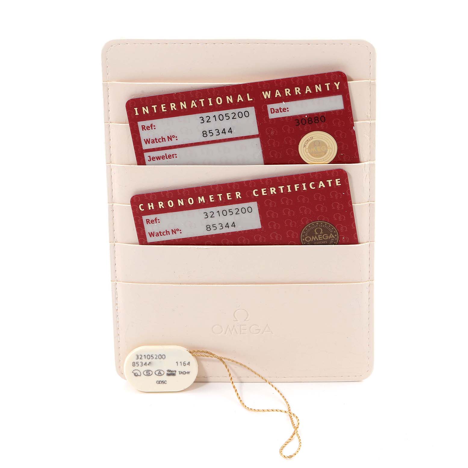 The image shows Omega Speedmaster 3210.52.00 Men
s Stainless Steel Black Dial 3210.52.00 Men
s Stainless Steel Black Dial watch accessories including an international warranty card, a chronometer certificate, and a tag.