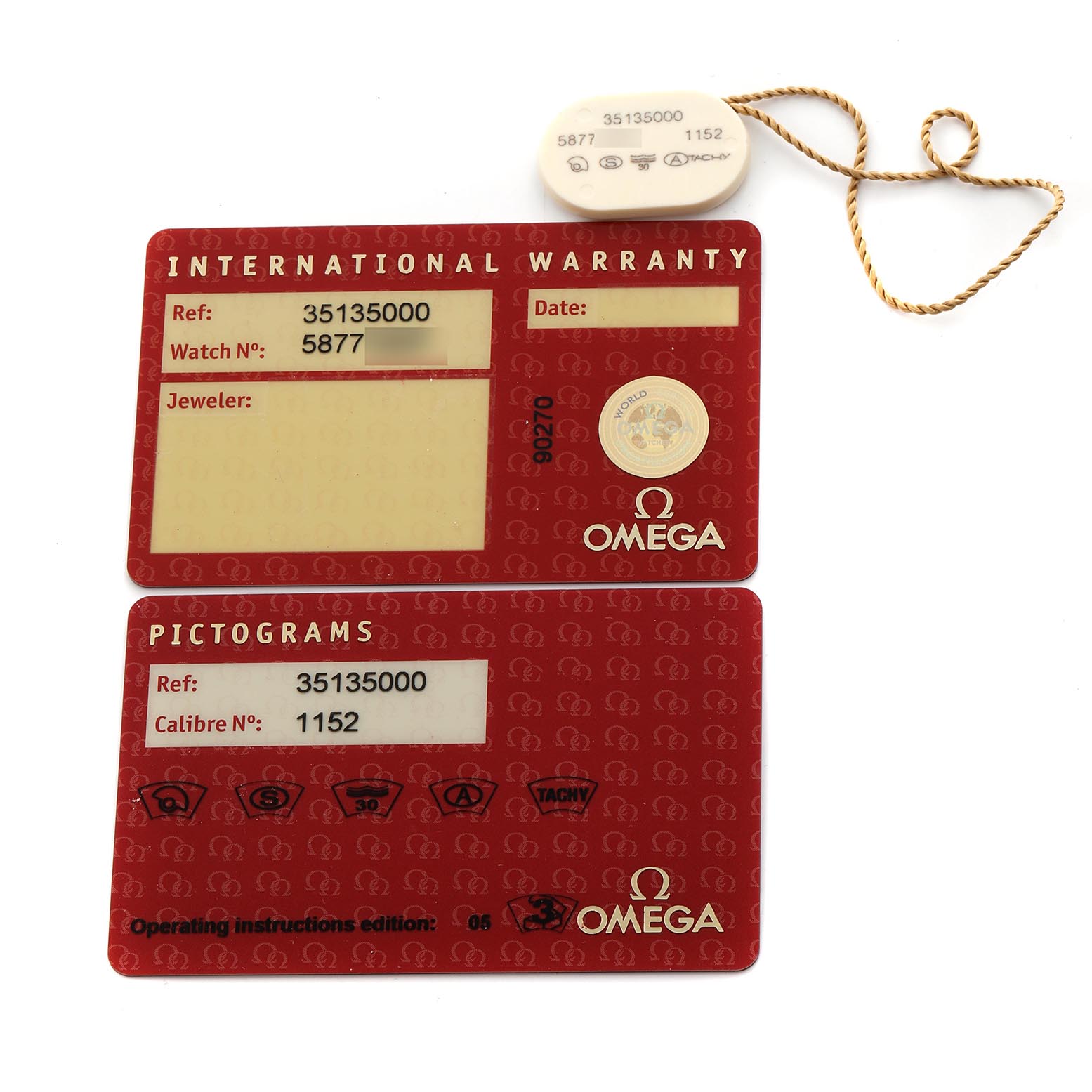 The image shows Omega Speedmaster 3513.50.00 Men's Stainless Steel Black Dial 3513.50.00 Men's Stainless Steel Black Dial warranty and pictogram cards, along with a tag, all viewed from above.