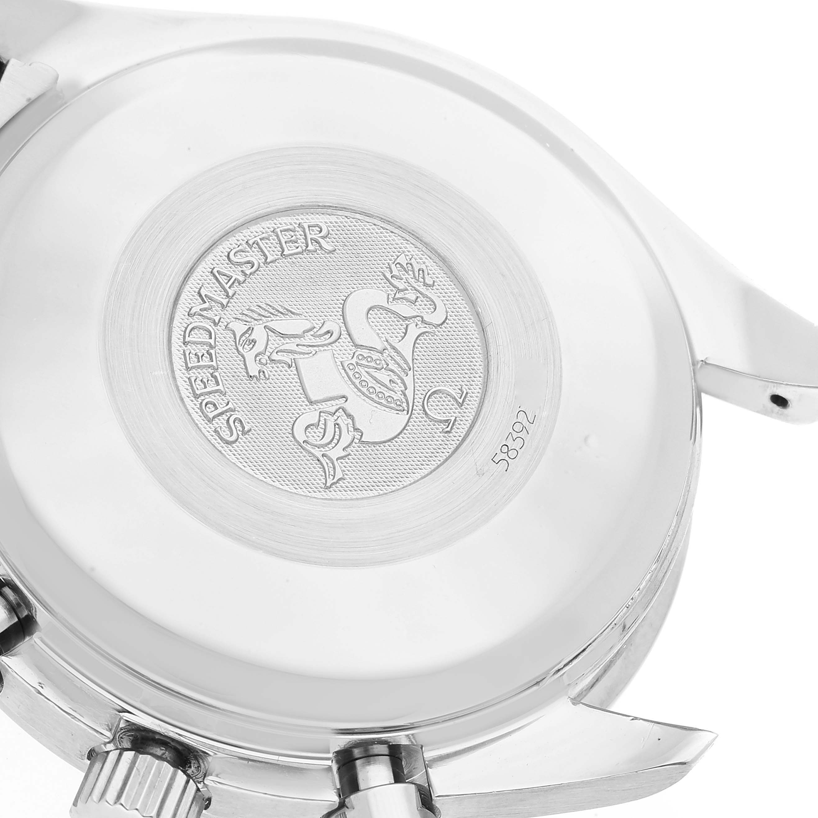 The image shows the back case of an Omega Speedmaster 3523.80.00 Men's Stainless Steel Blue Dial 3523.80.00 Men's Stainless Steel Blue Dial watch with its emblem and serial number visible.