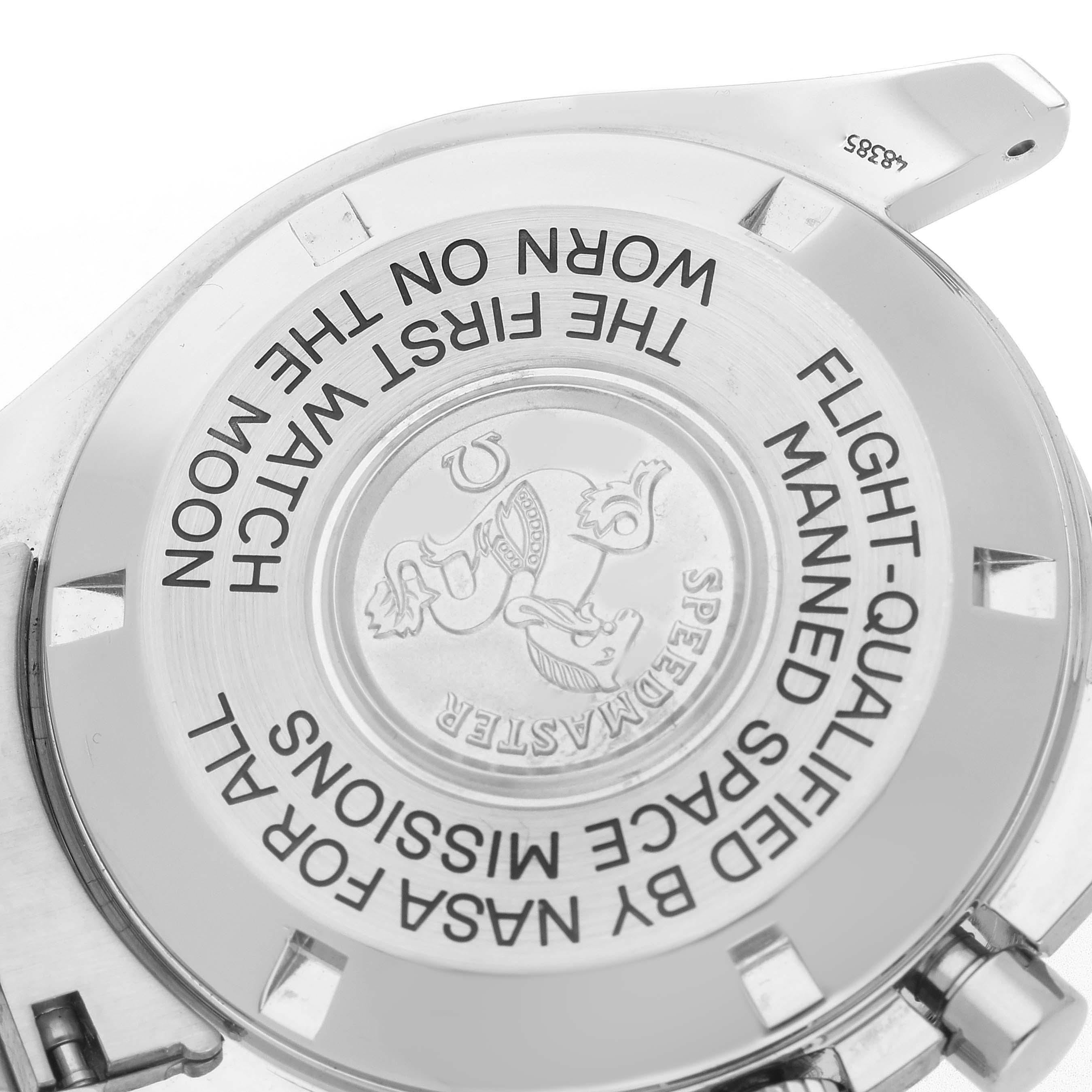 The image shows the case back of an Omega Speedmaster 3570.50.00 Men's Stainless Steel Black Dial 3570.50.00 Men's Stainless Steel Black Dial, displaying engraved text and emblem detailing.