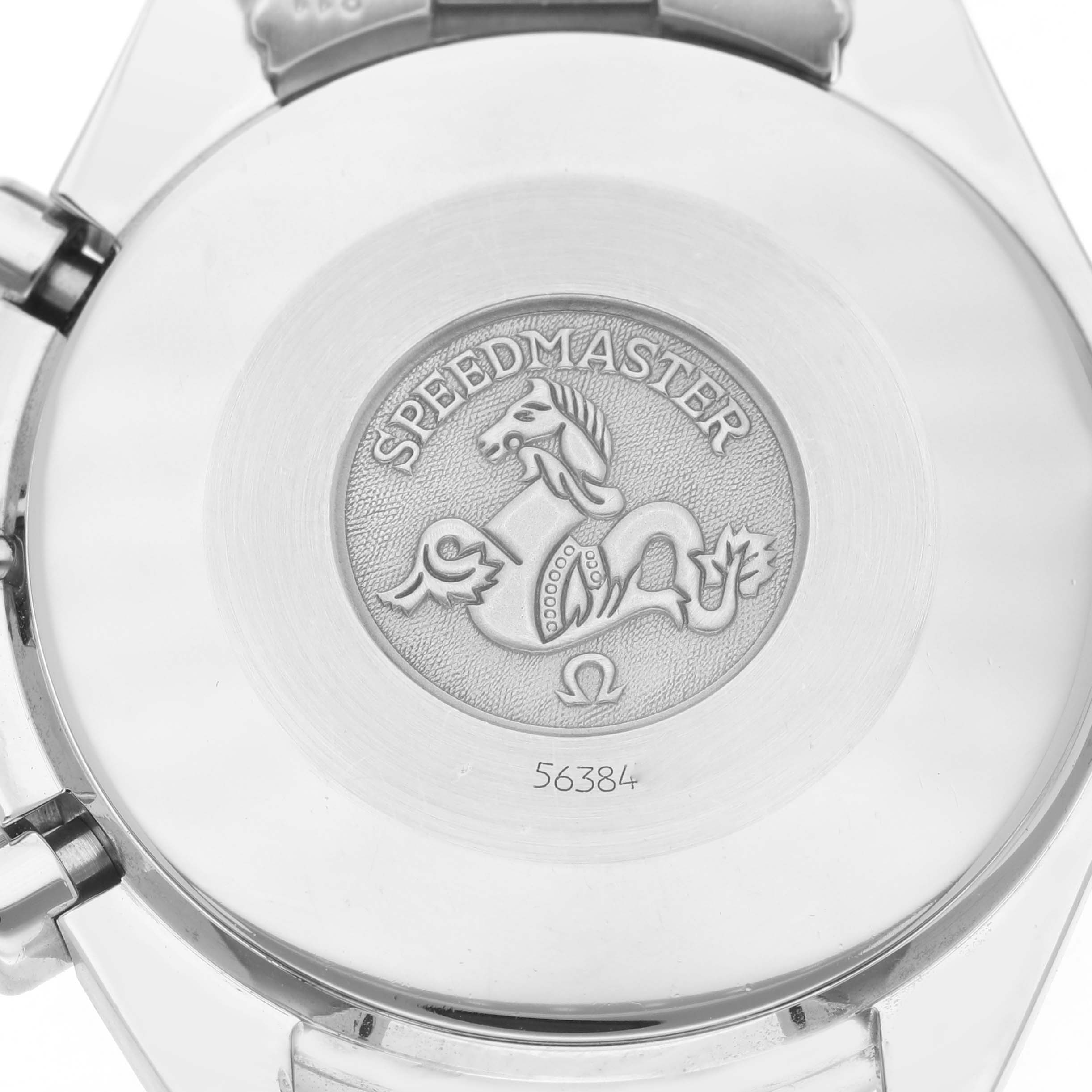 The image shows the case back of an Omega Speedmaster 3510.50.00 Men's Stainless Steel Black Dial watch, featuring an embossed emblem and the model's name.