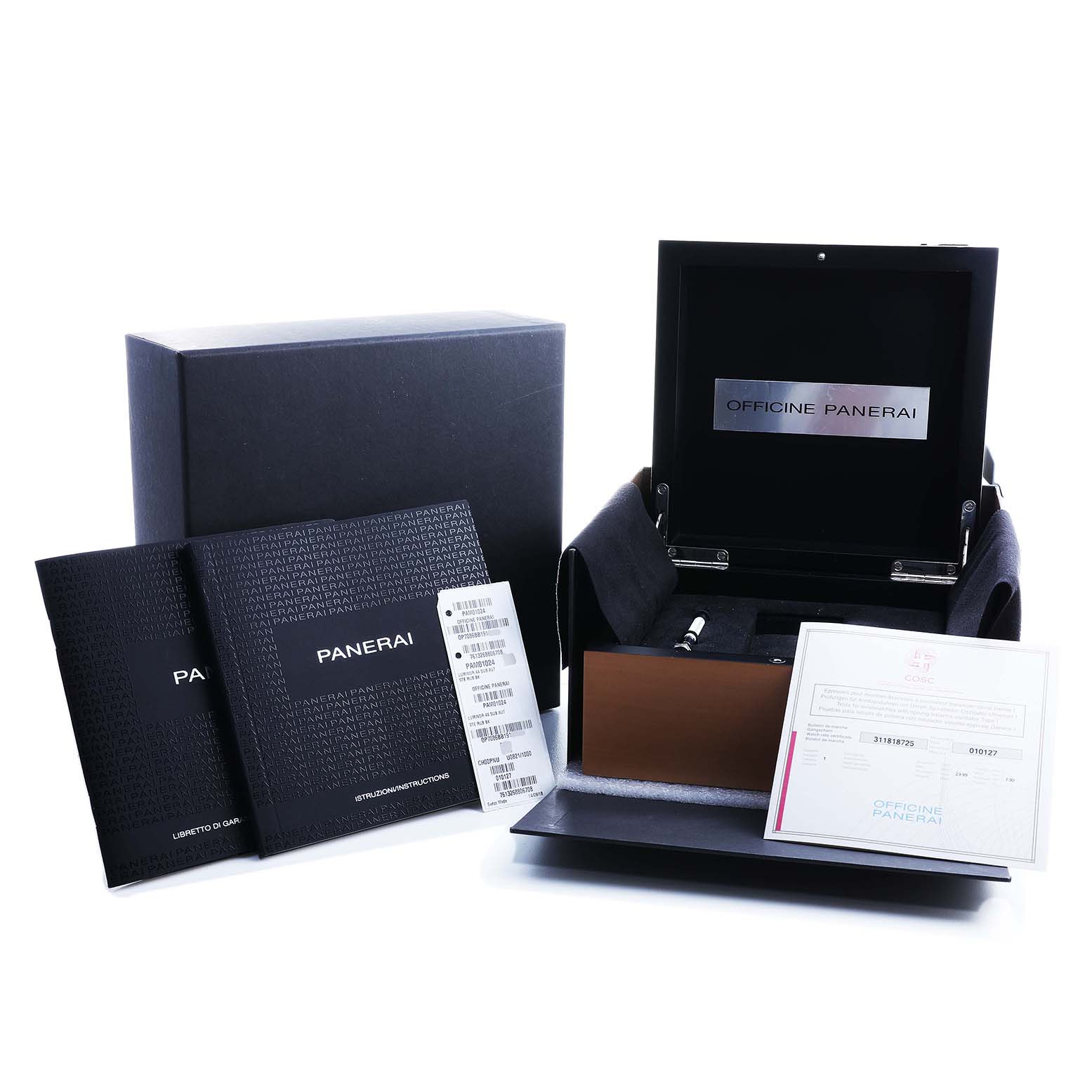 The image shows the packaging and accessories of a Panerai Submersible PAM01024 Men's Stainless Steel Black Dial watch, including a box, booklets, and certificates.