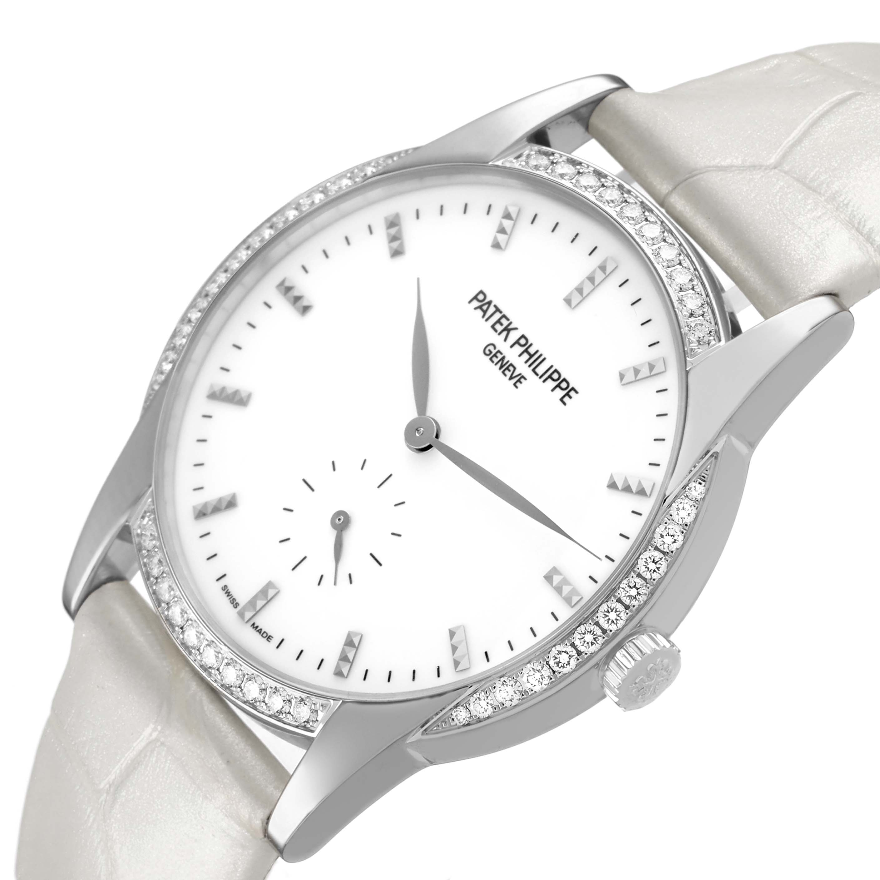 The Patek Philippe Calatrava 7122/200G-001 Women's White Gold White Dial watch is shown from an angled top view, highlighting its bezel, dial, and strap.