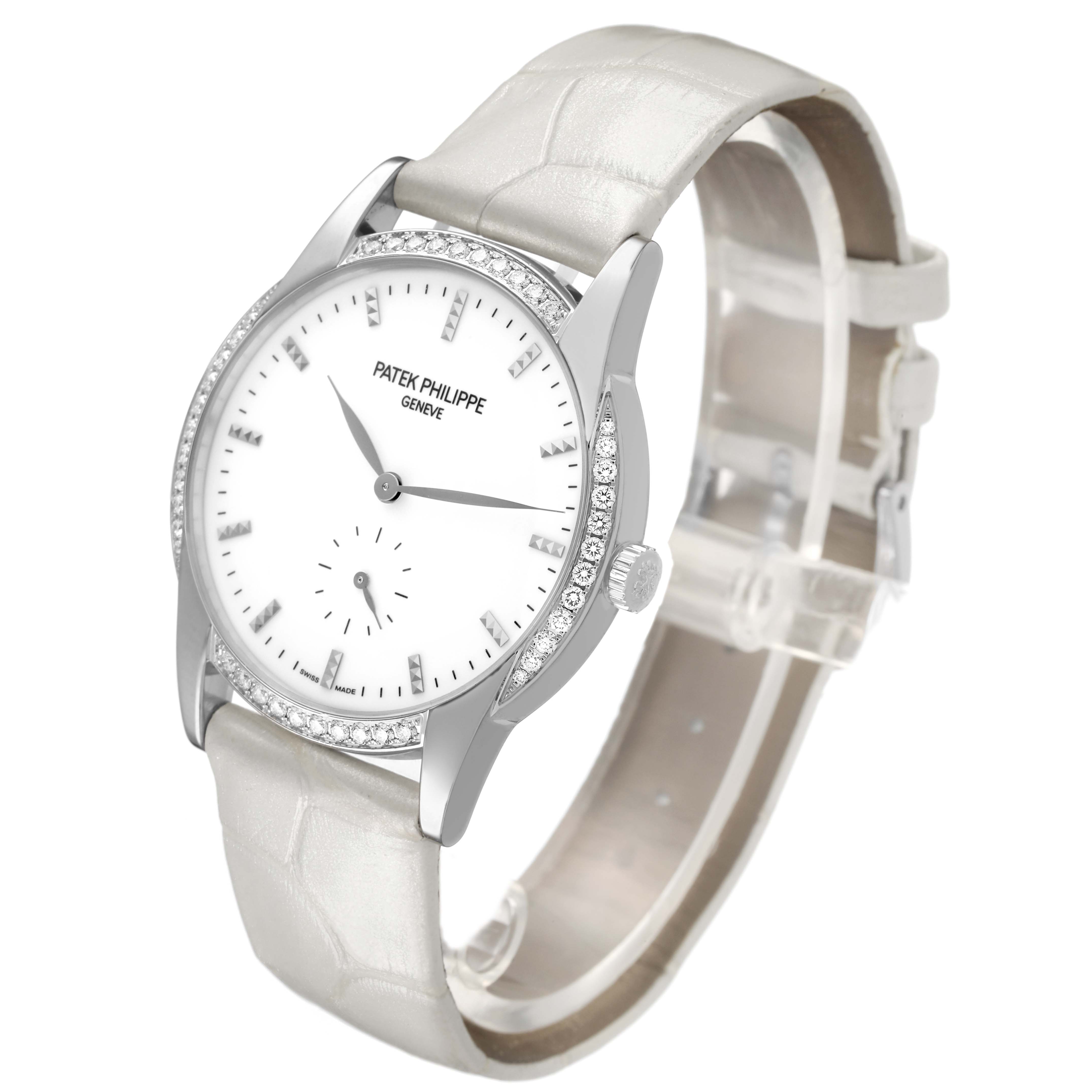 The Patek Philippe Calatrava 7122/200G-001 Women's White Gold White Dial watch is shown from a three-quarter angle displaying its face, bezel, lugs, and strap.