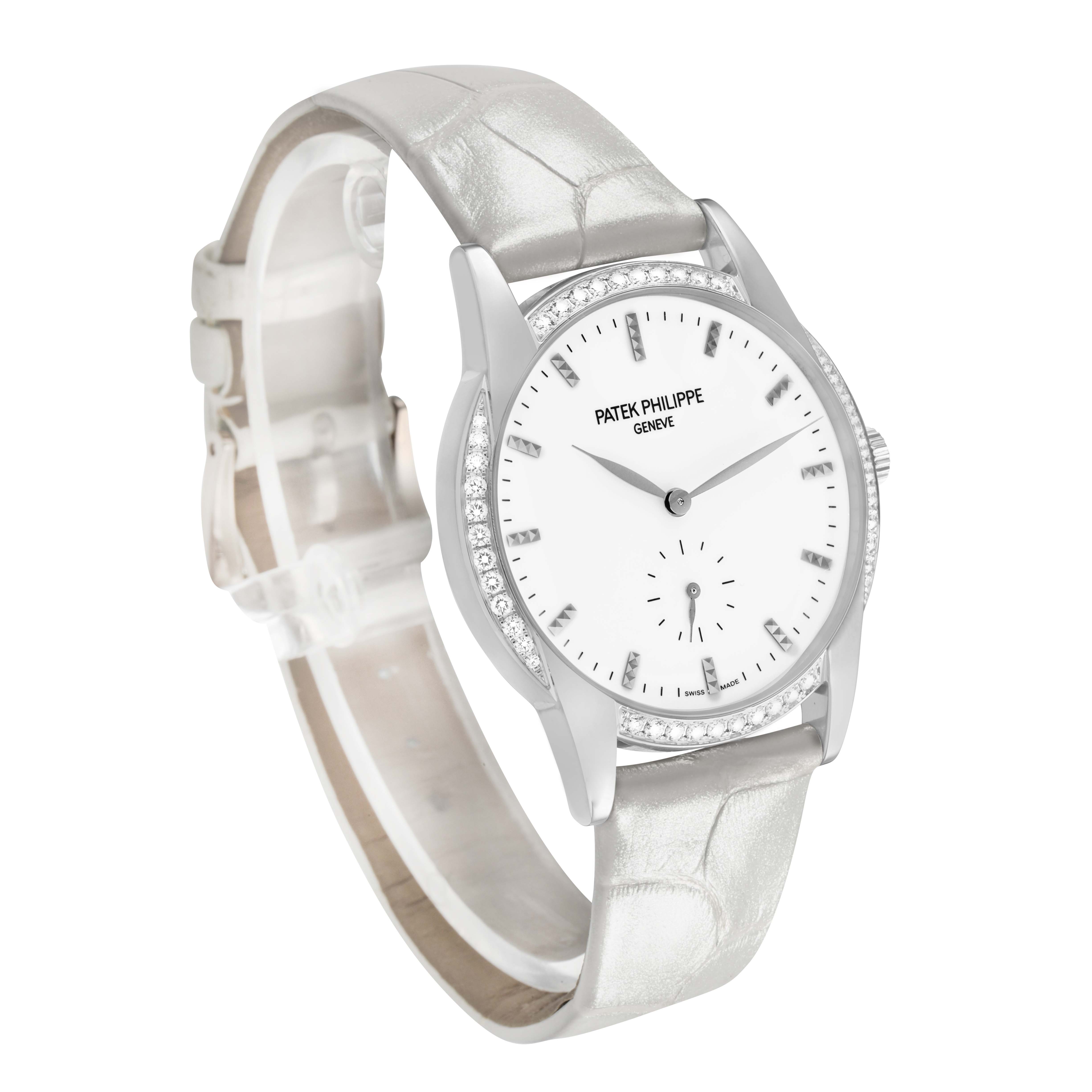 The Patek Philippe Calatrava 7122/200G-001 Women's White Gold White Dial watch is shown at a three-quarter angle, displaying the face, strap, and side view.