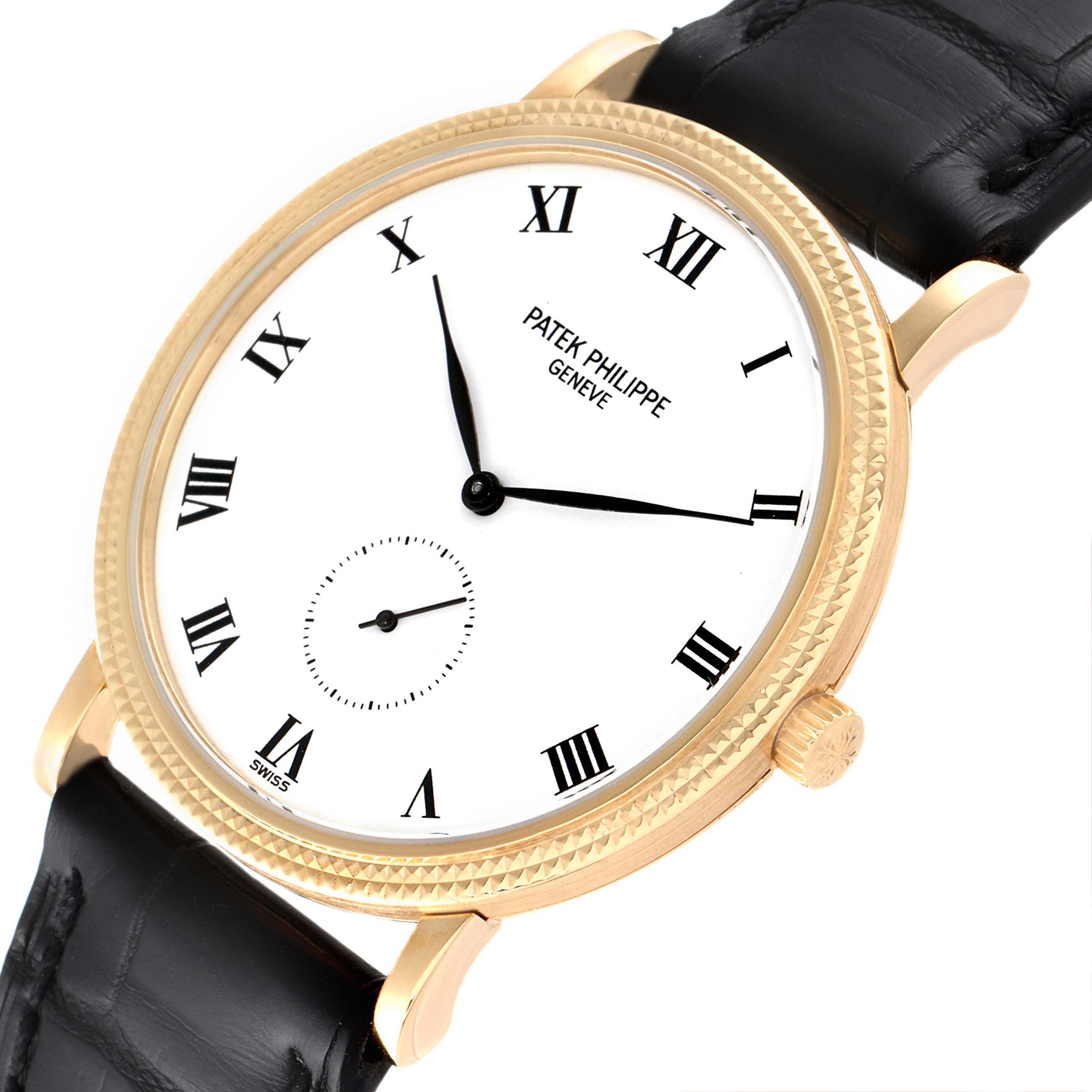 The image displays a Patek Philippe Calatrava 3919J Men's Yellow Gold White Dial 3919J Men's Yellow Gold White Dial watch angled slightly from above, showcasing the dial, bezel, crown, and part of the leather strap.