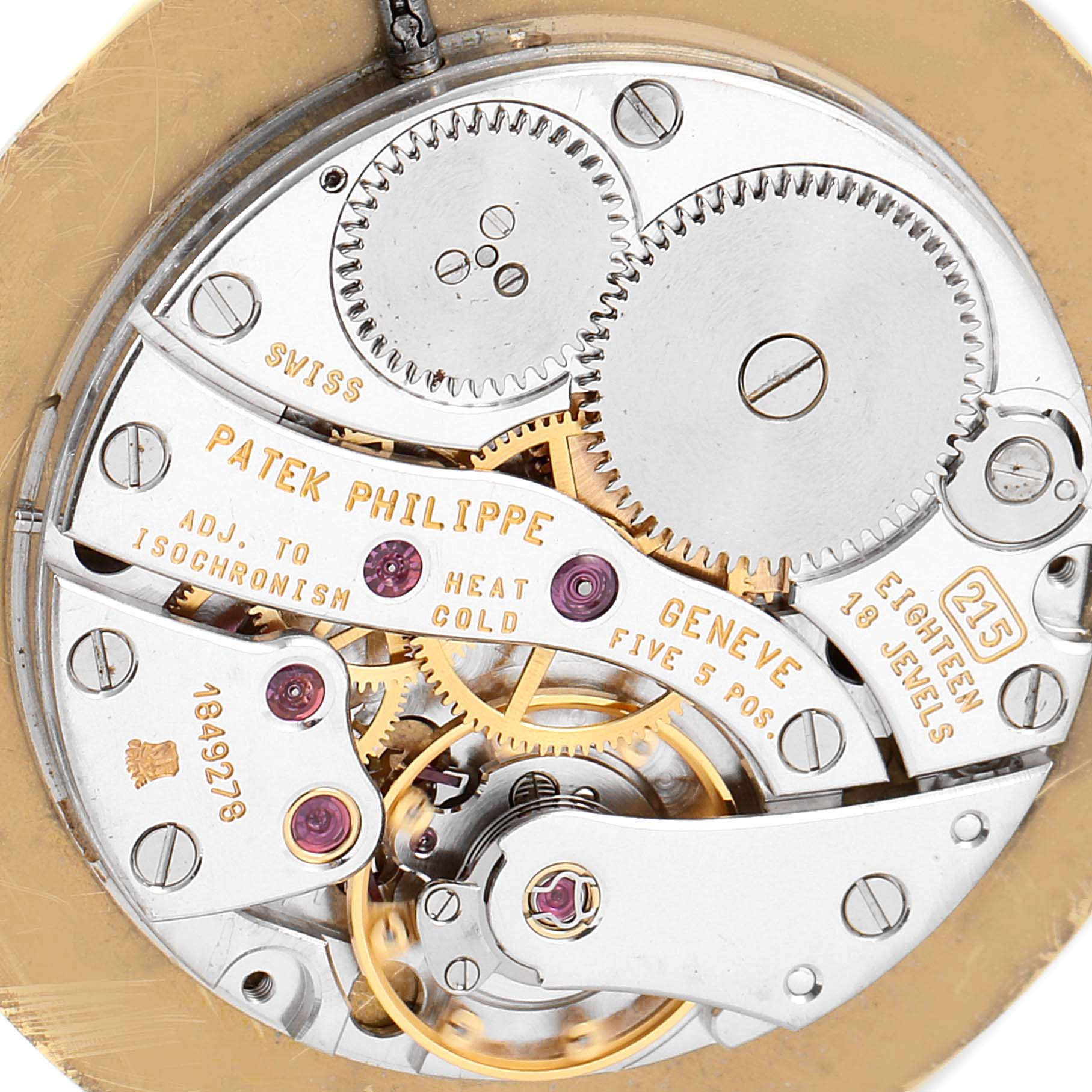 This image shows a close-up, top-down view of the inner mechanical components of a Patek Philippe Calatrava 3919J Men's Yellow Gold White Dial 3919J Men's Yellow Gold White Dial watch.