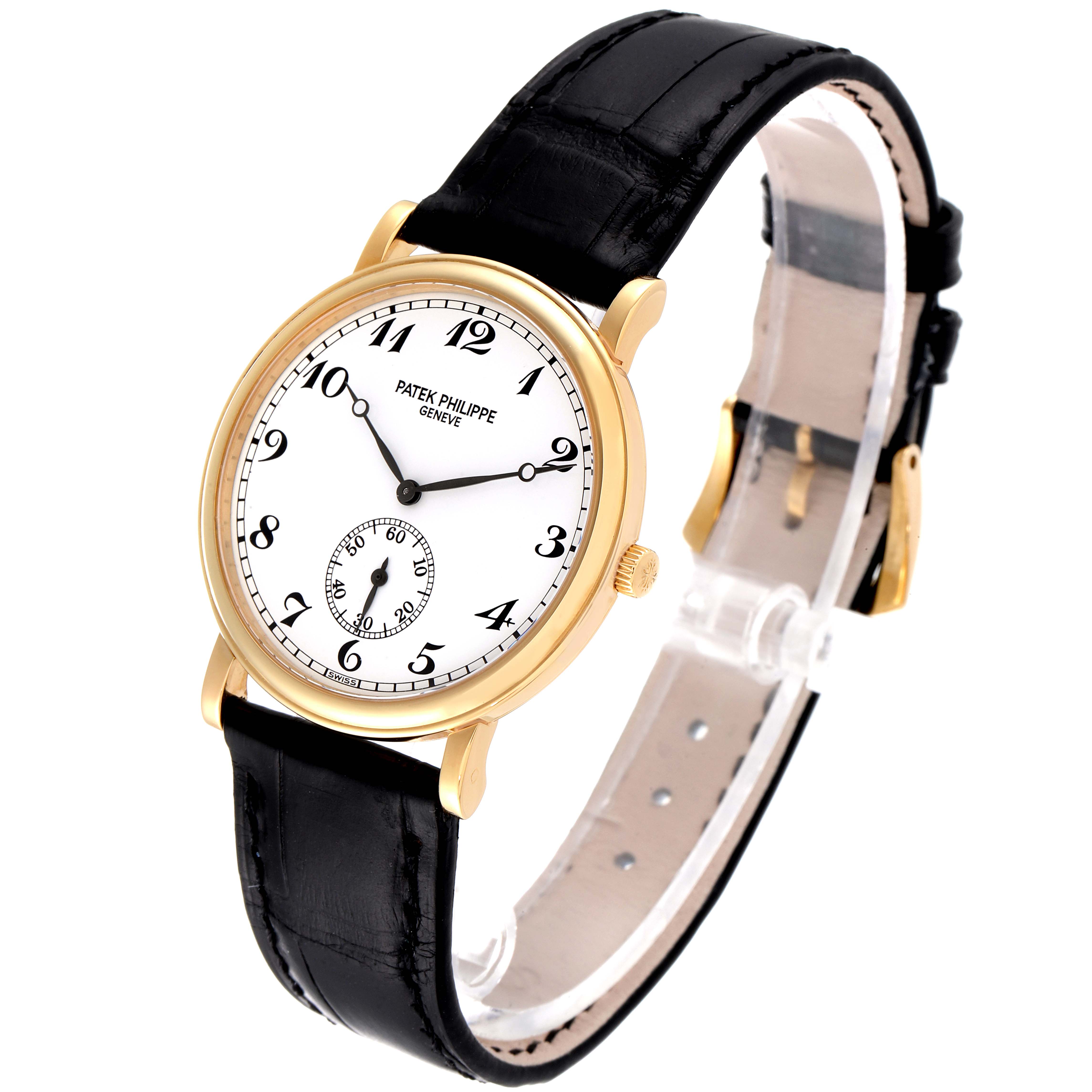 The image shows a Patek Philippe Calatrava 5022 Men's Yellow Gold White Dial 5022 Men's Yellow Gold White Dial watch at a three-quarter angle, highlighting its gold case, white dial, and black leather strap.