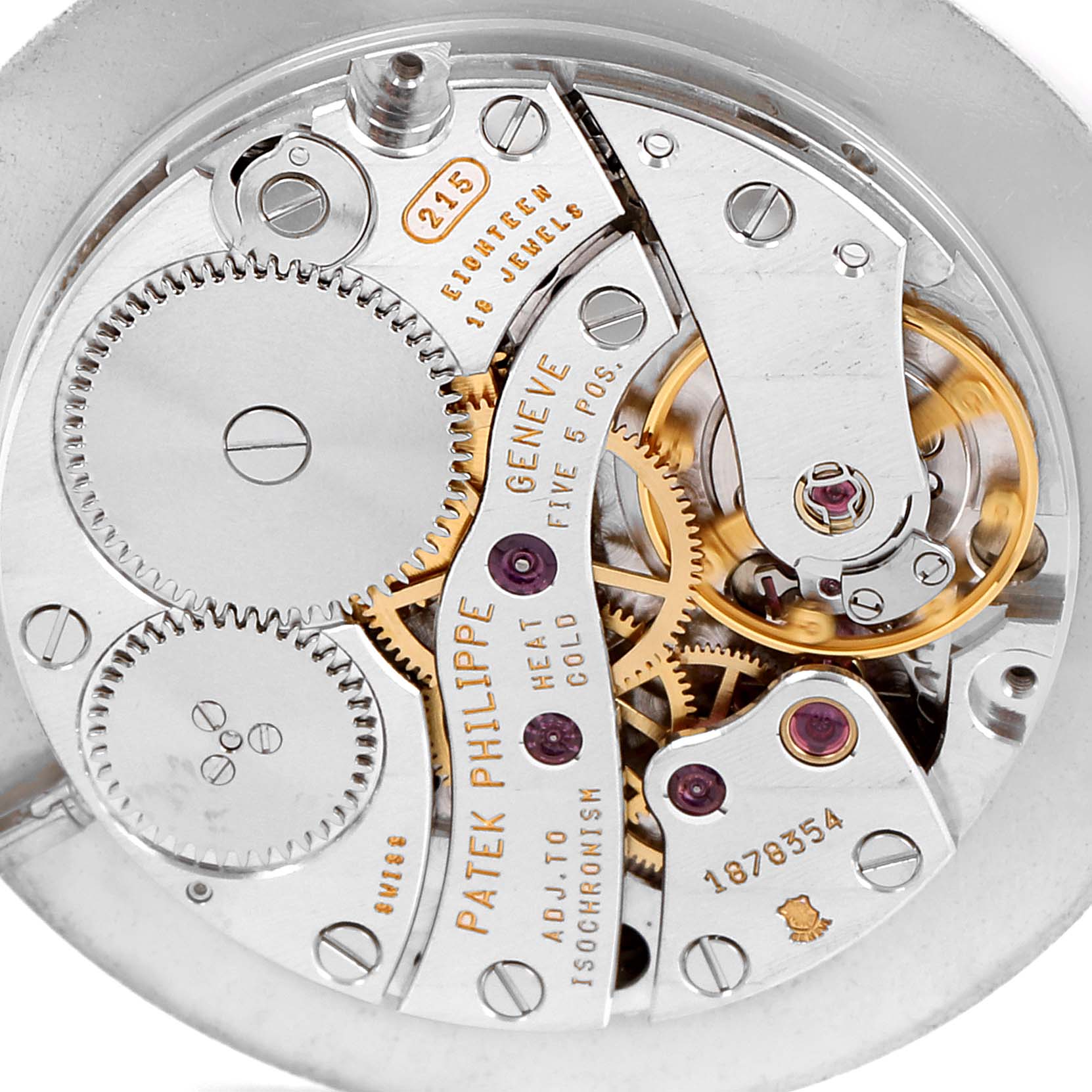 This is an angled close-up of the exposed mechanical movement of a Patek Philippe Calatrava 5022 Men's Yellow Gold White Dial 5022 Men's Yellow Gold White Dial watch.