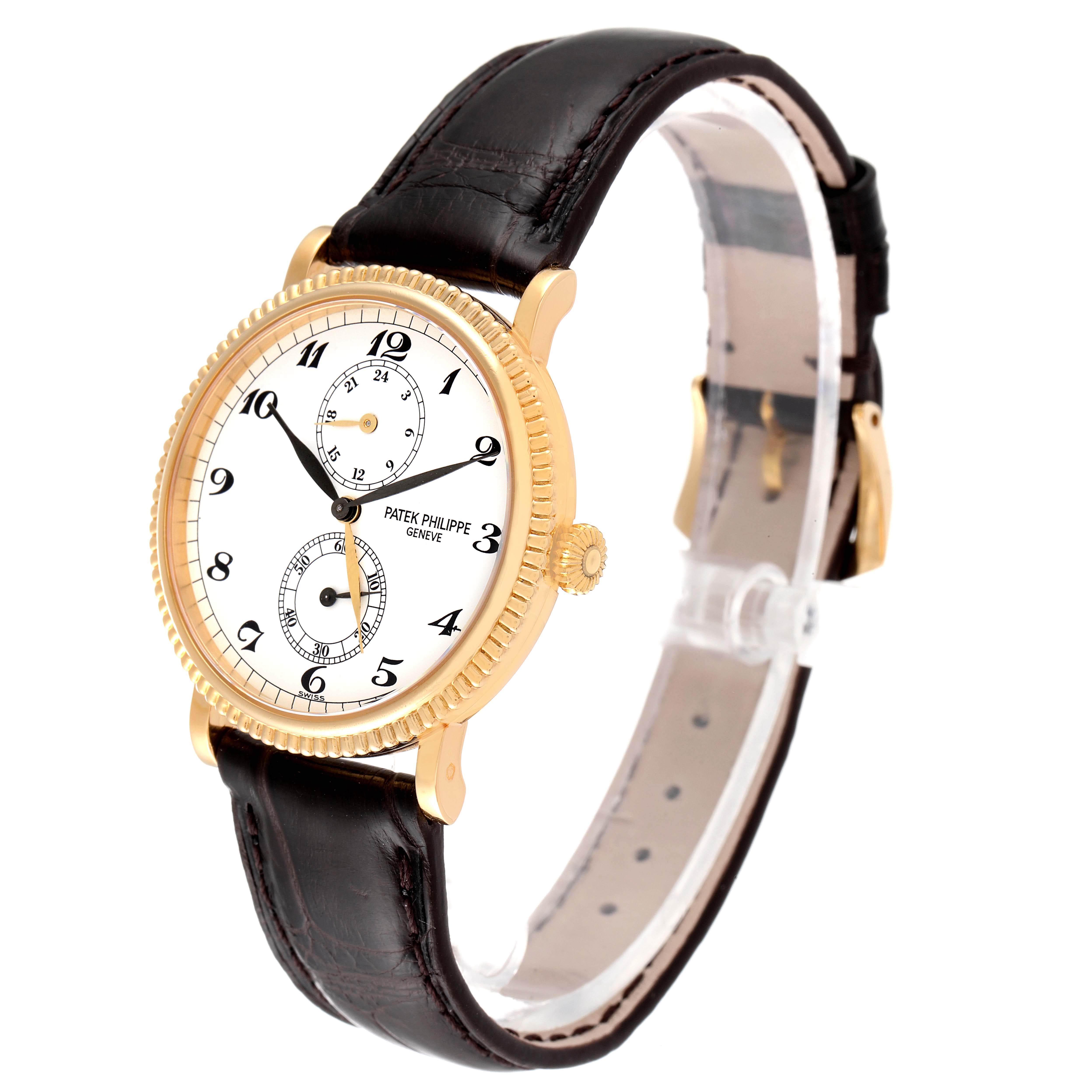 The image shows a Patek Philippe Calatrava 5034J Men
s Yellow Gold White Dial 5034J Men
s Yellow Gold White Dial watch at an angled side view, displaying its dial, case, crown, and leather strap.