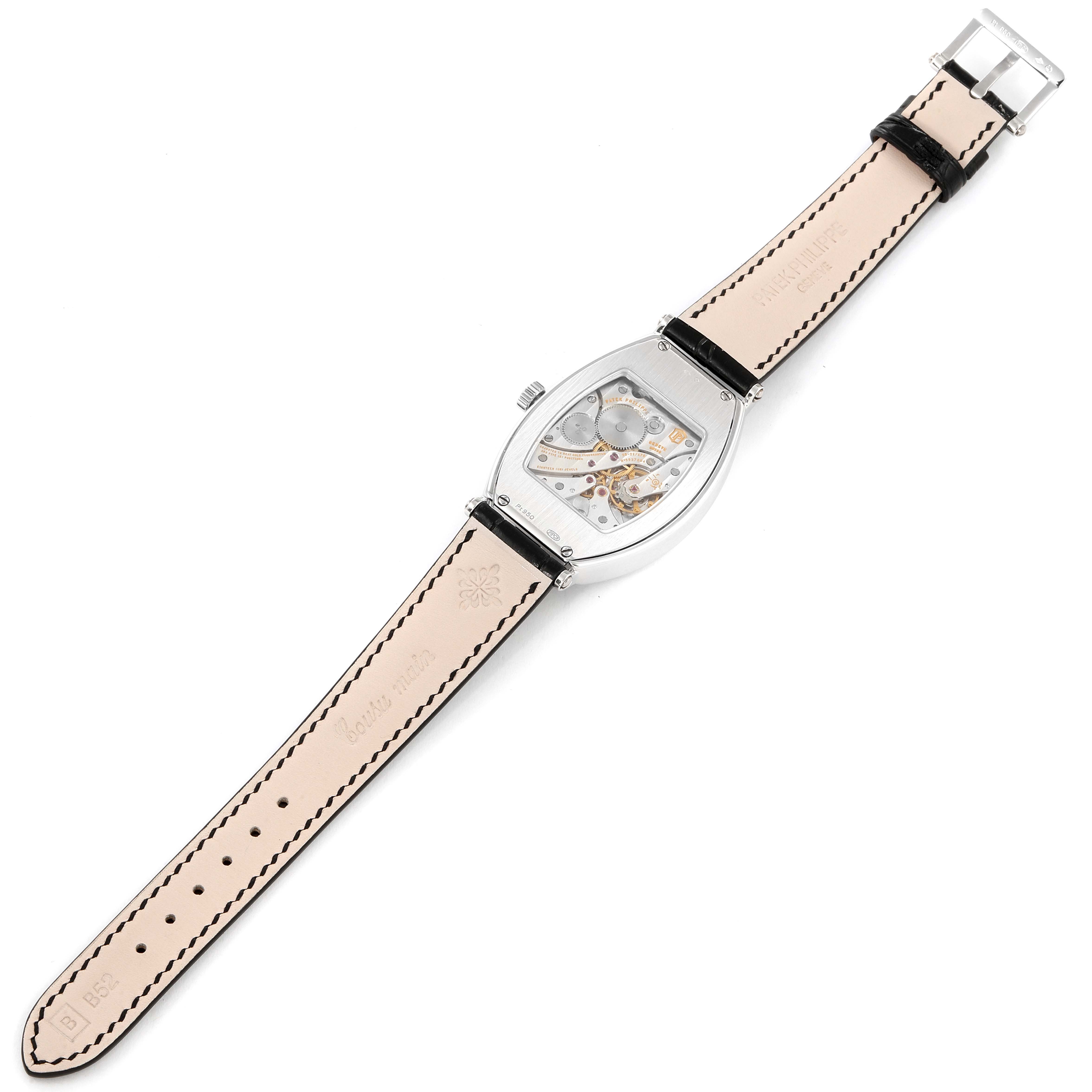 This image shows the back view of the Patek Philippe Gondolo 5098P Men's Platinum Silver Dial 5098P Men's Platinum Silver Dial watch, including its movement and leather strap.