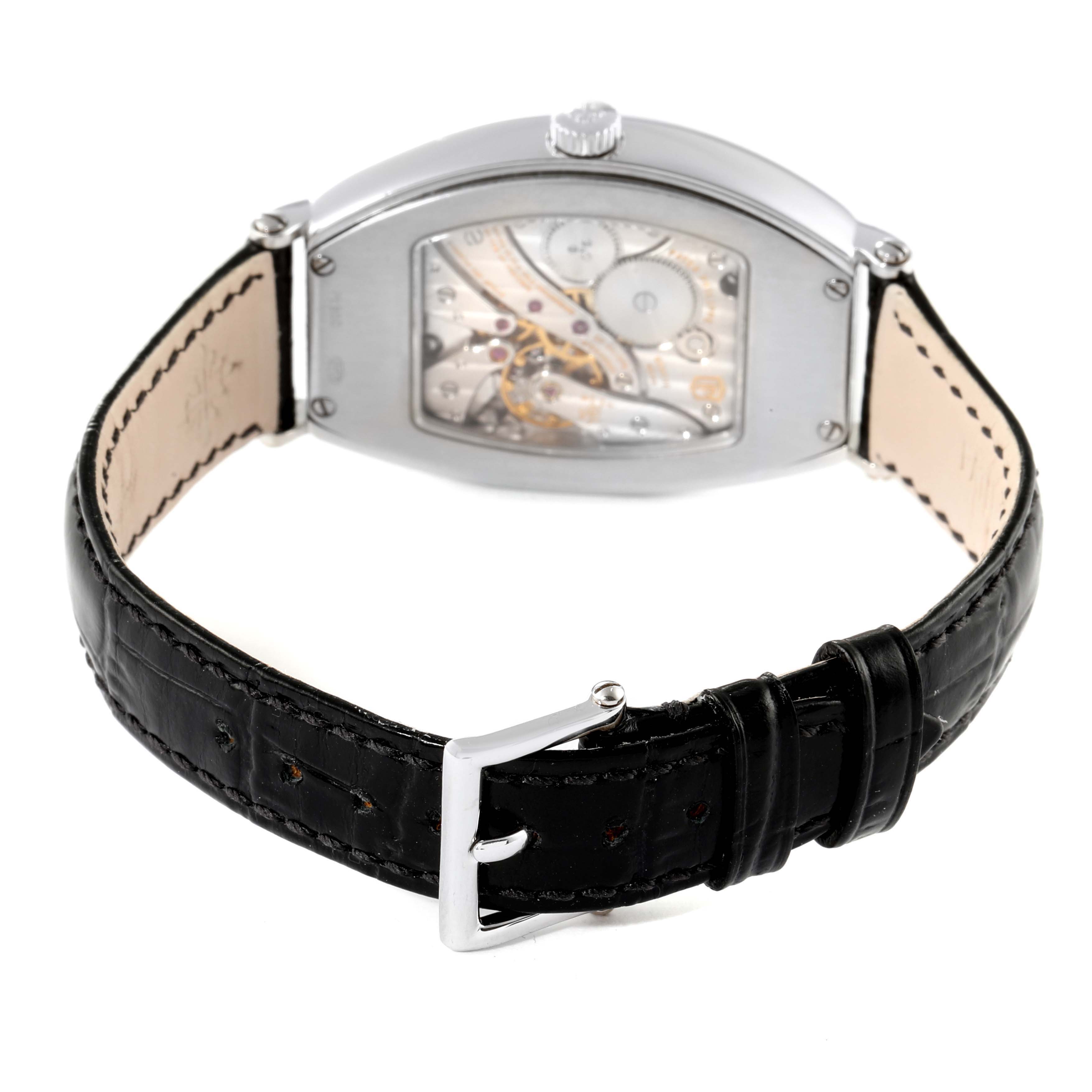 The image shows the back view of the Patek Philippe Gondolo 5098P Men
s Platinum Silver Dial 5098P Men
s Platinum Silver Dial watch, focusing on its leather strap and mechanical movement.